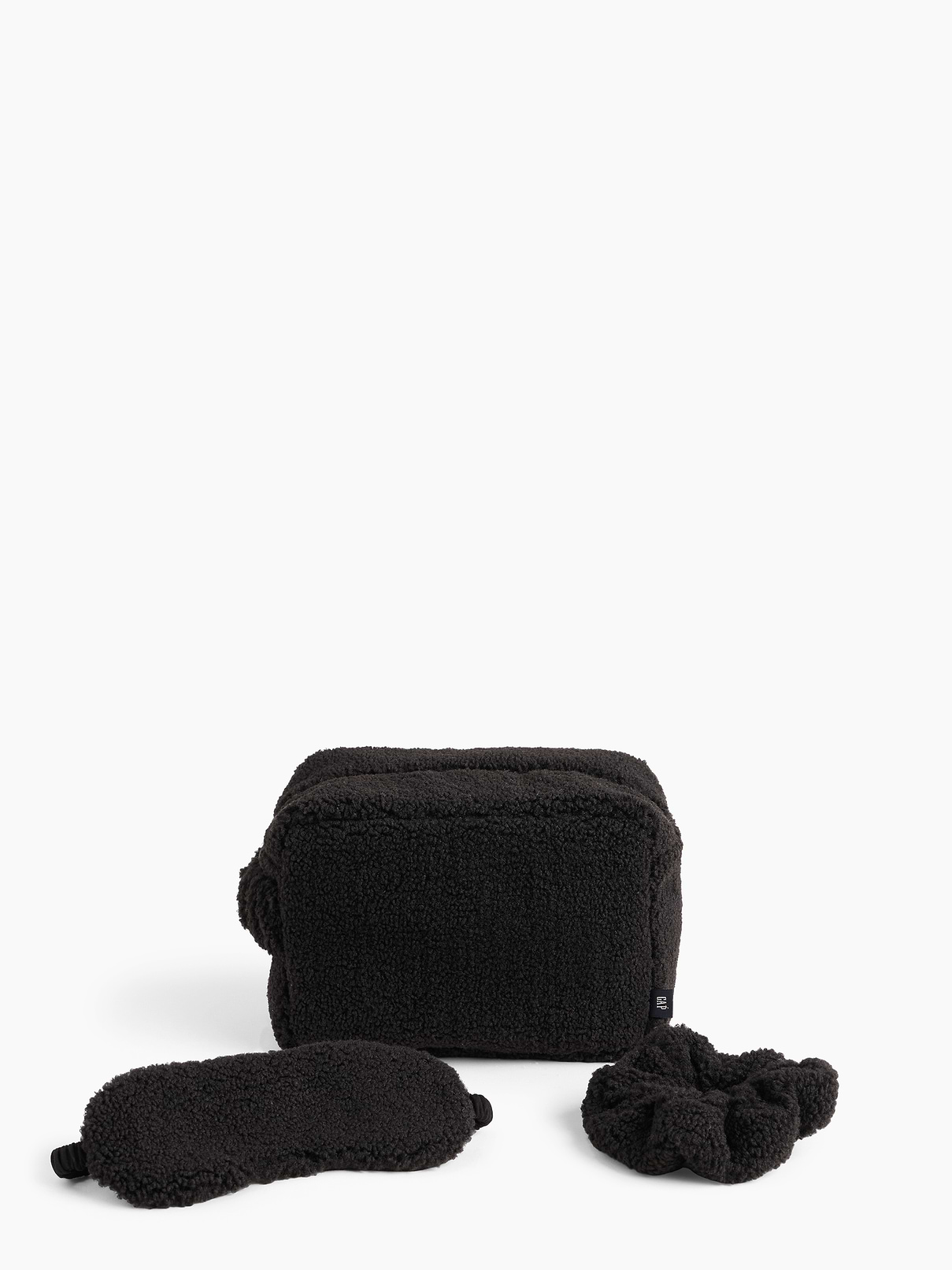 Image 1 of 3, Soft sherpa accessories bag, sleep mask, and scrunchie in a 3-piece set., Zip top closure at bag., Elasticized bands., This product was made in a factory that invests in gender equity and women’s empowerment through RISE. Learn more at gapinc.com/equity ., Product #1185364