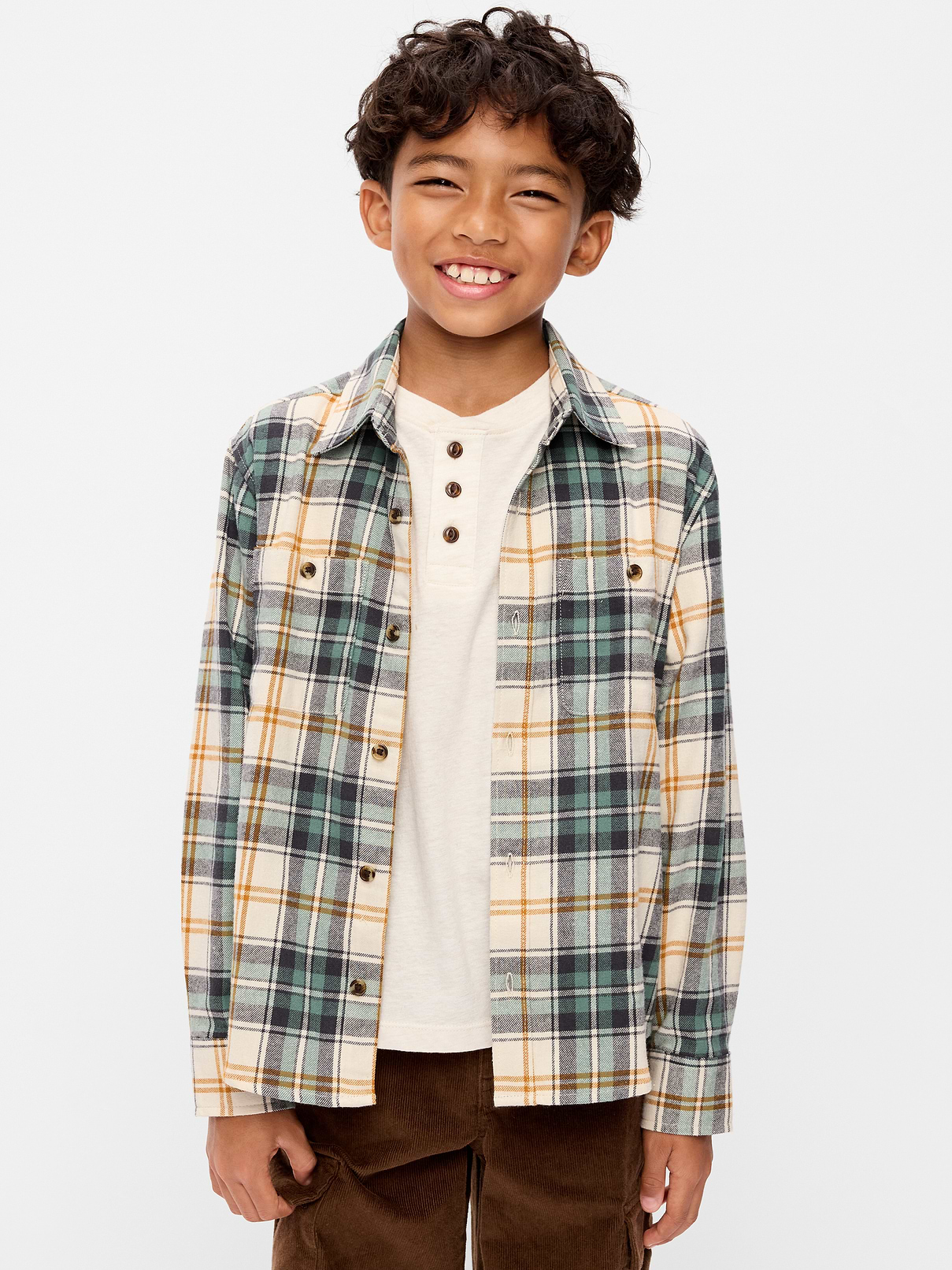 Image 1 of 2, spread collar, long sleeves, buttoned cuffs, buttoned pockets at chest, full length button front, curved hem, Product #907937