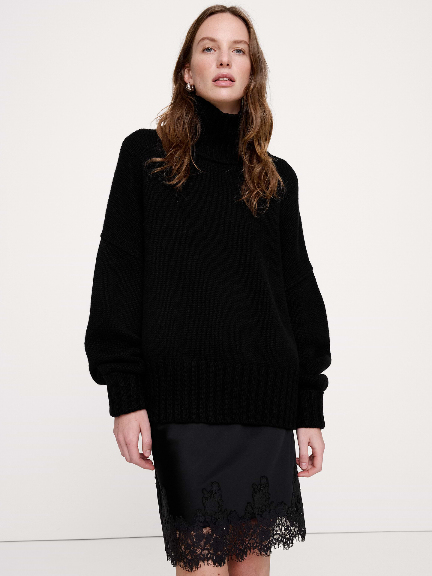 Image 1 of 2, We reimagined the classic turtleneck sweater with reversed seams in our soft and warm wool blend from Italy., Oversized fit: Extra room through chest, shoulders, and waist. Dropped shoulder seams., Fabric from Italy's Filpucci mill., Turtleneck., Straight hem., Product #1180195