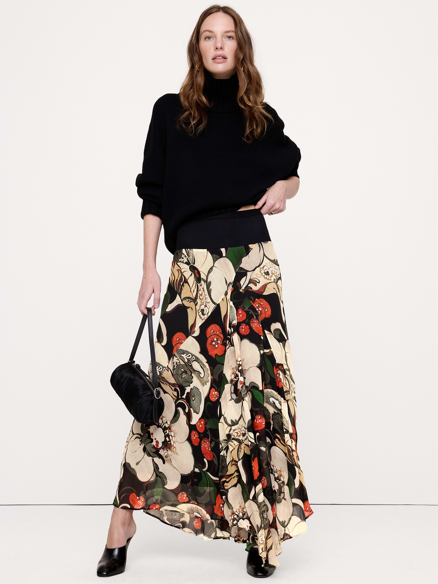 Image 1 of 3, Not your average maxi skirt, we cut this one from a light-as-chiffon fabric, opting for a paneled construction to create an asymmetrical hemline that moves with every step. Plus, we added a ribbed-knit waistband for a super-smooth and comfortable fit., A-Line fit: High rise. Fitted waist with a flare silhouette., Elastic waistband (pull-on design)., Fully lined., Product #915541