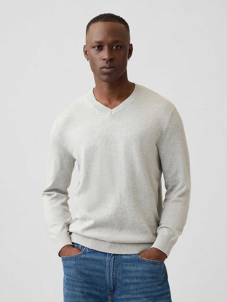 Image 1 of 5, Soft cotton knit., Long sleeves with ribbed cuffs., V-neck., Ribbed hem., This product was made in a factory that invests in gender equity and women’s empowerment through RISE. Learn more at, Product #1178478