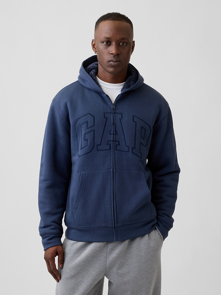 Image 1 of 4, Soft, comfy fleece., Cozy sherpa lining at hood and body., Dropped shoulder, long sleeves with banded cuffs., Hood, zip front., Gap logo at front., Kanga pockets., Banded hem., Product #1178041