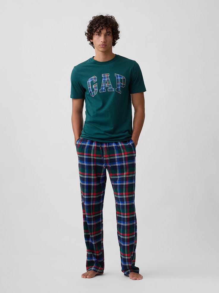 Image 1 of 4, Smooth flannel sleep pants., Drawcord ties at elasticized waist, faux fly., On-seam pockets., Select styles have allover print or plaid., Shop matching PJs for all., This product was made in a factory that invests in gender equity and women’s empowerment through RISE. Learn more at, Product #1178714