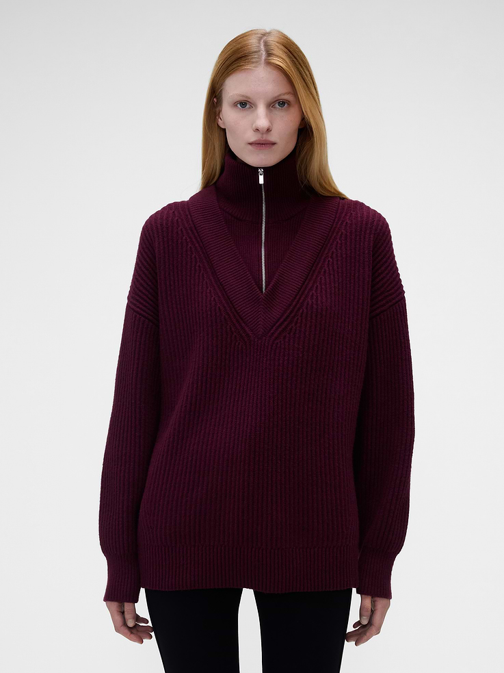 Image 1 of 7, Supersoft cotton-blend sweater pullover. In an oversized fit., High neck with zipper closure., V-neck detailing., Long sleeves with dropped shoulders., Product #1183576