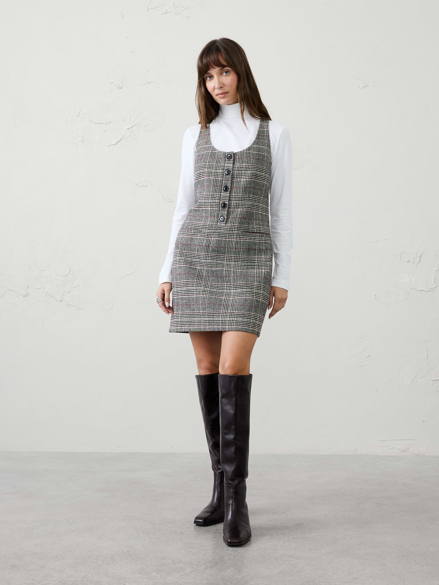 Image 1 of 7, Crafted in a menswear‑inspired plaid fabrication, this mini shift dress offers a tailored look with a modern edge. Designed to be worn on its own or layered over lightweight knits, turtlenecks, and shirting, it’s a versatile piece that transitions effortlessly through the season., Scoop neckline. Sleeveless with wide shoulder straps., Partial button‑front placket., Partial button‑front placket., Front welt pockets., Adjustable back belt with buckle detail., Shift silhouette., Fully lined., Made exclusively for Banana Republic Factory., Product #1178247