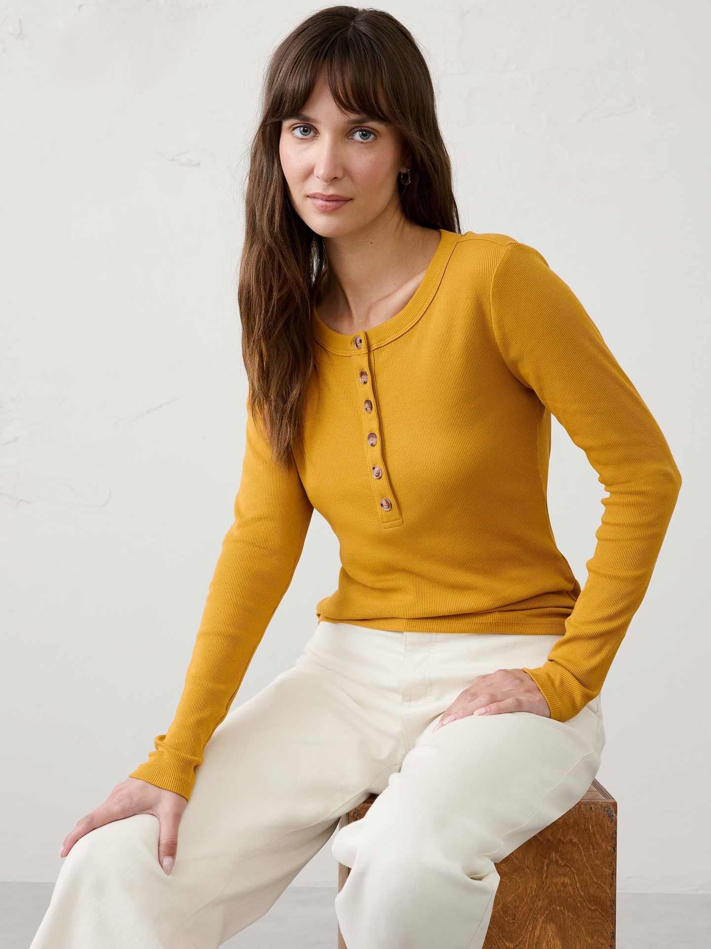 Image 1 of 8, Henley neckline. Long sleeves., Fitted at the waist., Straight hem., Made exclusively for Banana Republic Factory., Product #1178100