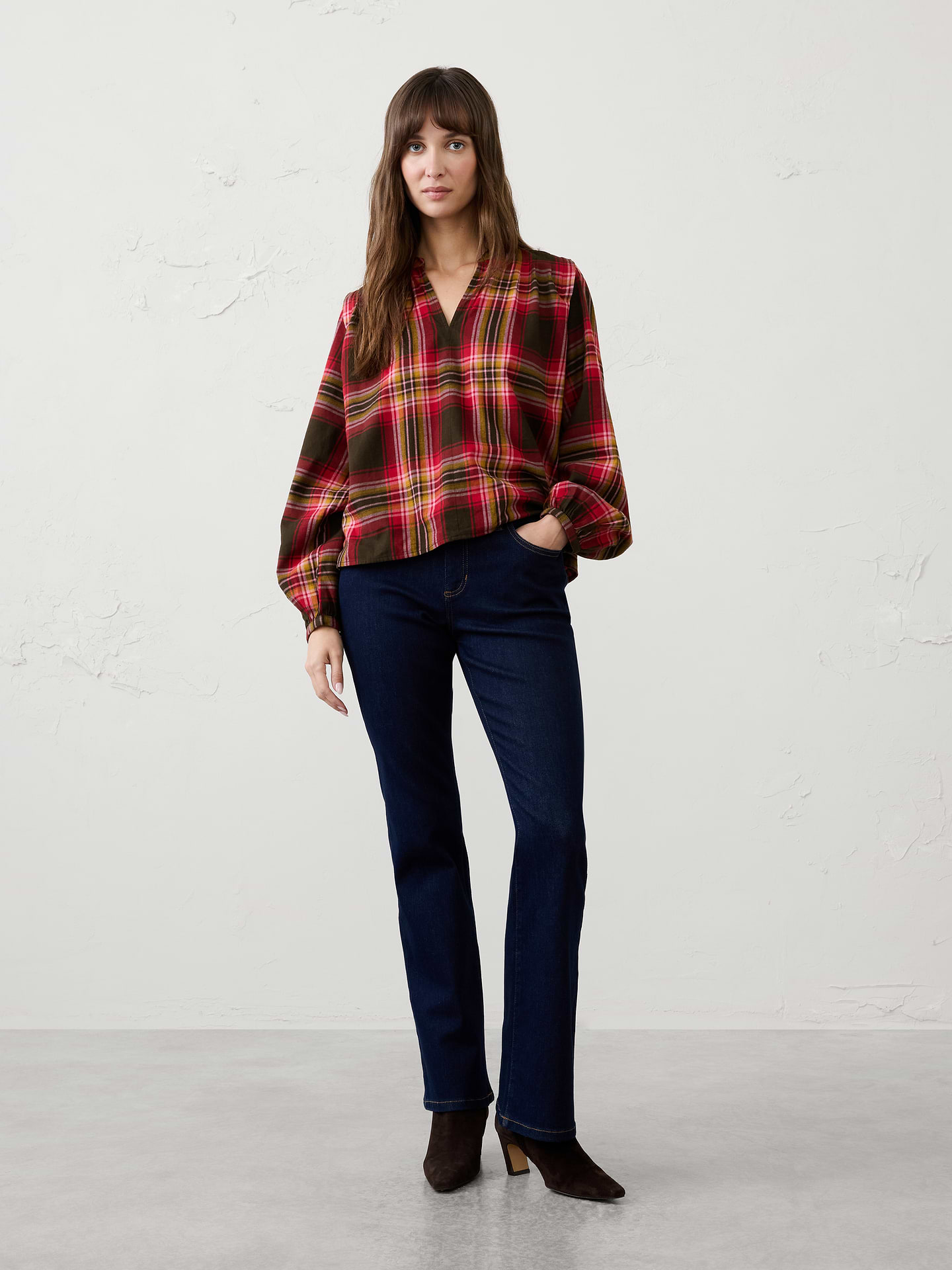 Image 1 of 4, Crafted in a soft plaid flannel, our blouse features feminine pleated‑shoulder detailing for an elevated touch. Cozy yet polished, it brings warmth, texture, and effortless style to holiday gatherings and seasonal everyday dressing., Band collar with split V-neck opening. Long blouson sleeves with buttoned cuffs., Pleated shoulder detailing., Back yoke with center pleated detailing., Made exclusively for Banana Republic Factory., Product #1185897