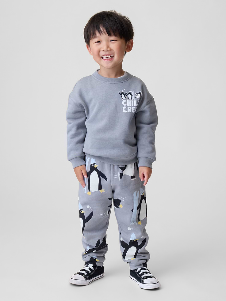 Image 1 of 4, Our softer than soft sweats. Brushed on the inside. Smooth on the outside. Made so that no two are alike., Soft cotton-blend relaxed joggers., Elasticized waist., Front slant pockets., Embroidered Brannan Bear at hip., This product was made in a factory that invests in gender equity and women’s empowerment through RISE. Learn more at gapinc.com/equity ., Product #515110