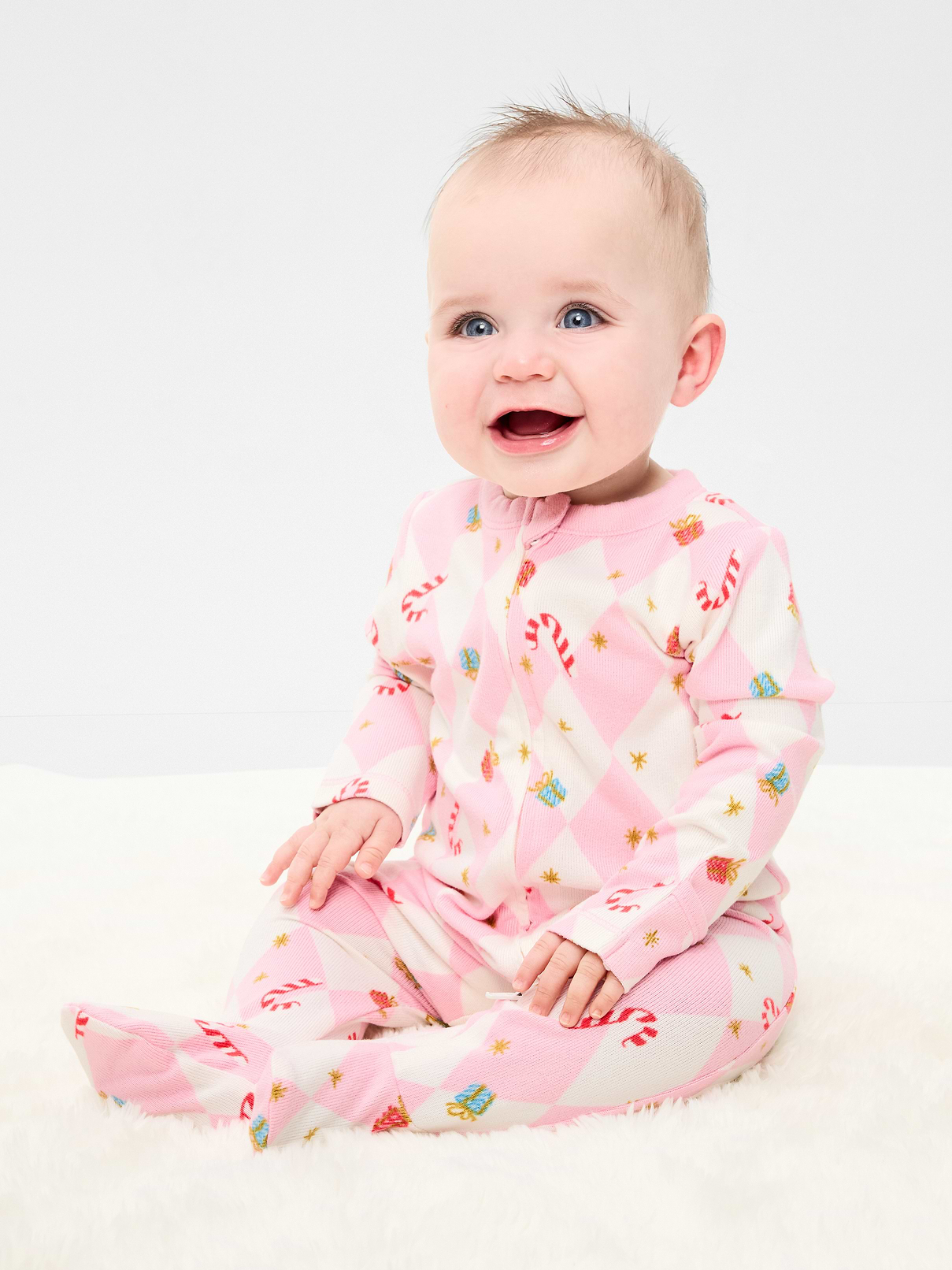 Image 1 of 3, crew neck, long sleeves, fold-over mittens at each sleeve, full-length reversible zipper, sewn-in feet, allover print, Product #909837