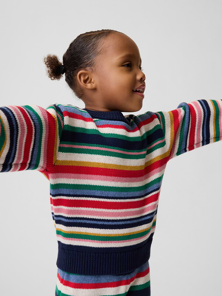 Image 1 of 4, Soft knit cotton sweater., Crewneck., Long sleeves., Ribbed cuffs and hem., Graphic at front or allover print., This product was made in a factory that invests in gender equity and women’s empowerment through RISE. Learn more at gapinc.com/equity ., Product #1184977