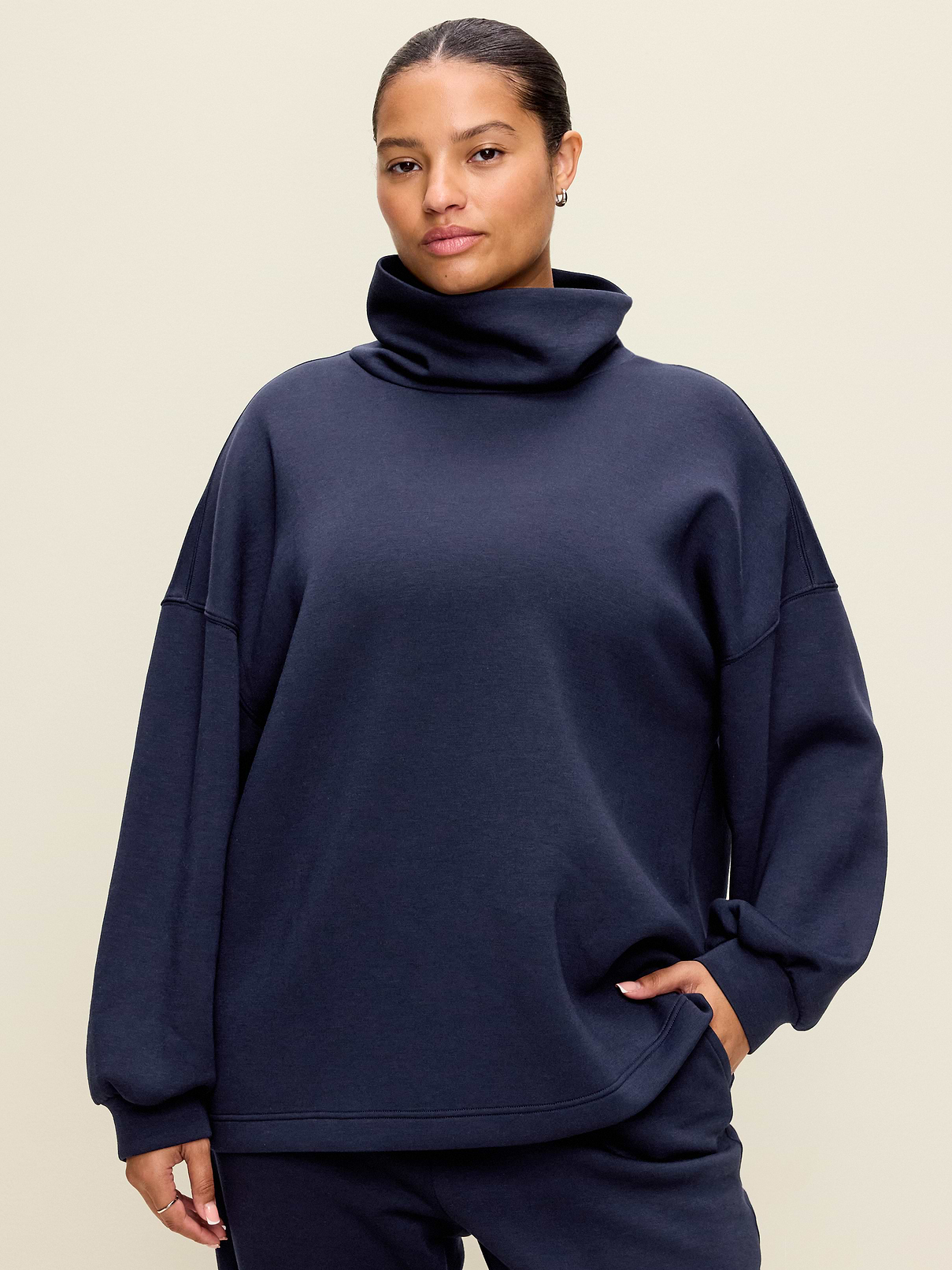 Image 1 of 4, Make your moves in Old Navy Sport's Bounce Fleece: Our signature smooth spacer fabric that keeps its shape., funnel neck, long sleeves, elasticized cuffs, 4-way stretch, breathable, pullover style, Product #915127