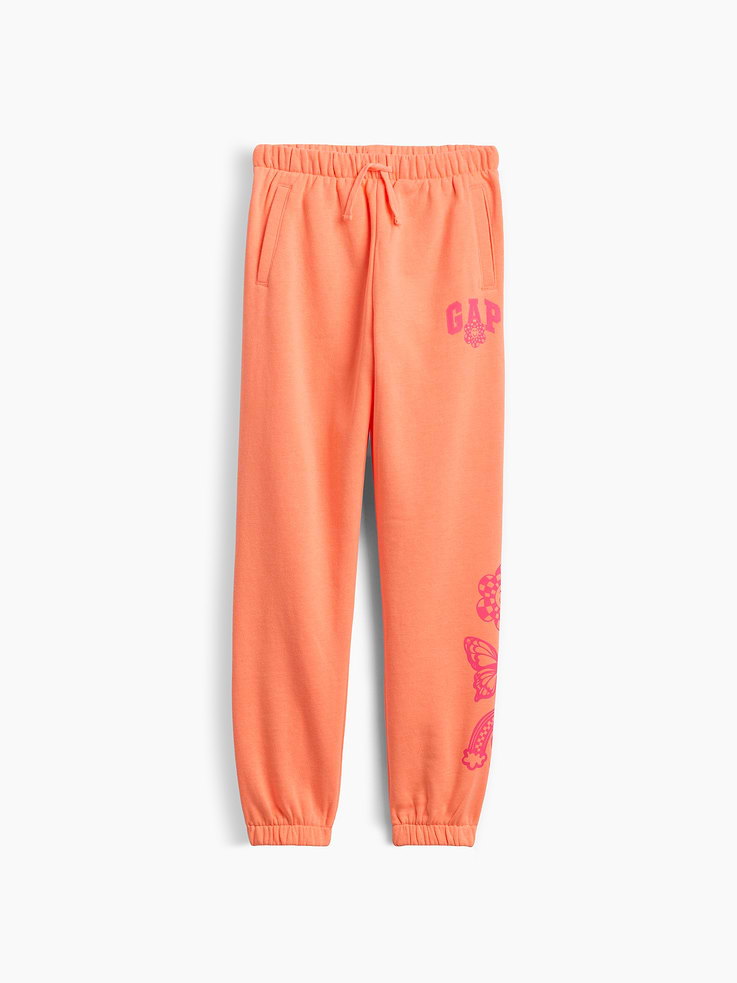 Image 1 of 3, This product is made with/contains at least 23% recycled polyester. Compared to virgin materials, using recycled materials helps reduce resource use and waste., Soft, comfy fleece., Drawcord ties at elasticized waist., On-seam pockets., Gap logo at hip., Elasticized cuffs., Select styles have allover print., This product was made in a factory that invests in gender equity and women’s empowerment through RISE. Learn more at, Product #1178436