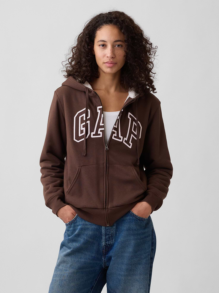 Image 1 of 5, This product is made with/contains 23% recycled polyester. Compared to virgin materials, using recycled materials helps reduce resource use and waste., Soft French terry., Cozy sherpa lining at hood and body., Dropped shoulder, long sleeves with banded cuffs., Drawcord ties at hood, zip front., Gap logo at front., Kanga pockets., Banded hem., Product #1178027