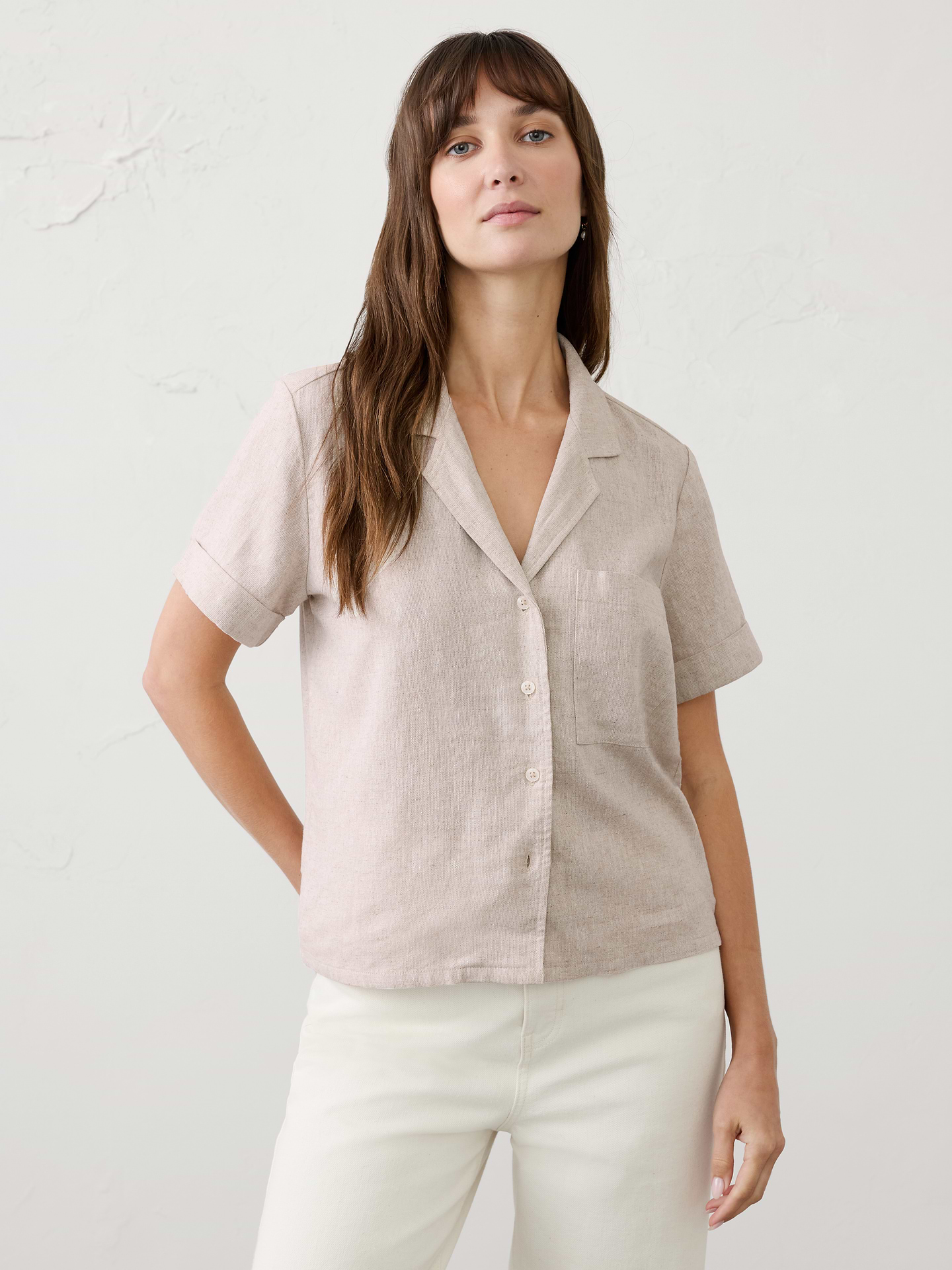 Image 1 of 4, Crafted from a soft linen blend, this cropped shirt offers a lightweight, breathable feel with effortless polish., LINEN-BLEND: This light and breathable fabric is a must for those warm days and styles effortlessly for all occasions., Lapel collar. Cuffed short sleeves., Button-front closure., Chest pocket., Made exclusively for Banana Republic Factory., Product #1185889