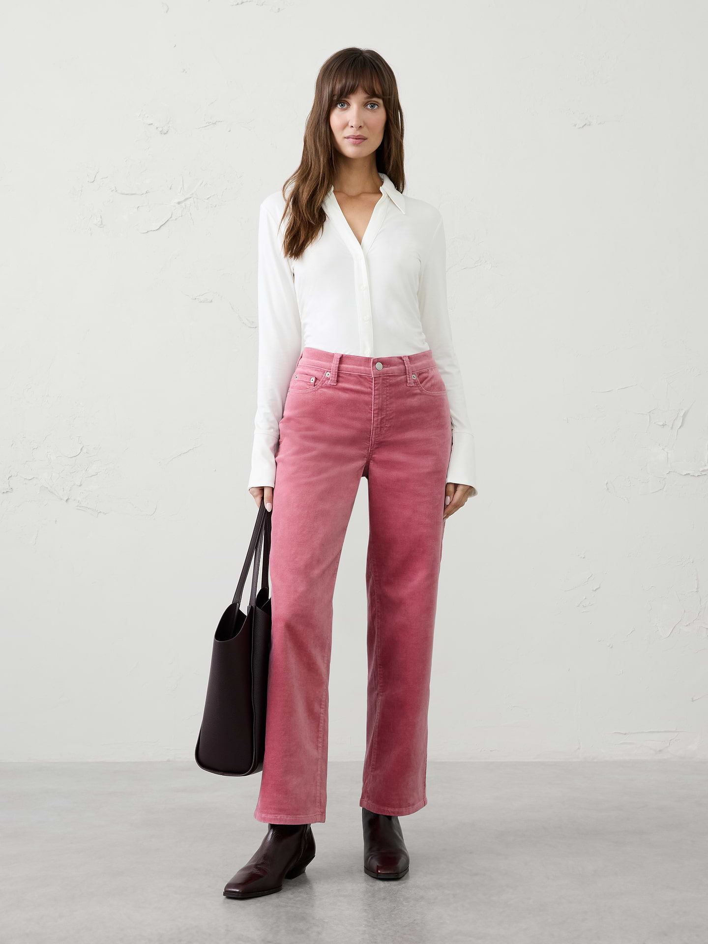 Image 1 of 6, Elevate your everyday denim with this straight-fit mid-rise velvet pant. Crafted from luxurious velvet, this versatile style combines exceptional softness with a polished finish that transitions effortlessly from day to night. Perfect for pairing with sweaters, blouses, or tailored jackets., Fitted. Mid rise. Straight leg. Full length., Shank button closure with zip fly. Belt loops., Traditional five-pocket design., Made exclusively for Banana Republic Factory., Product #1181442
