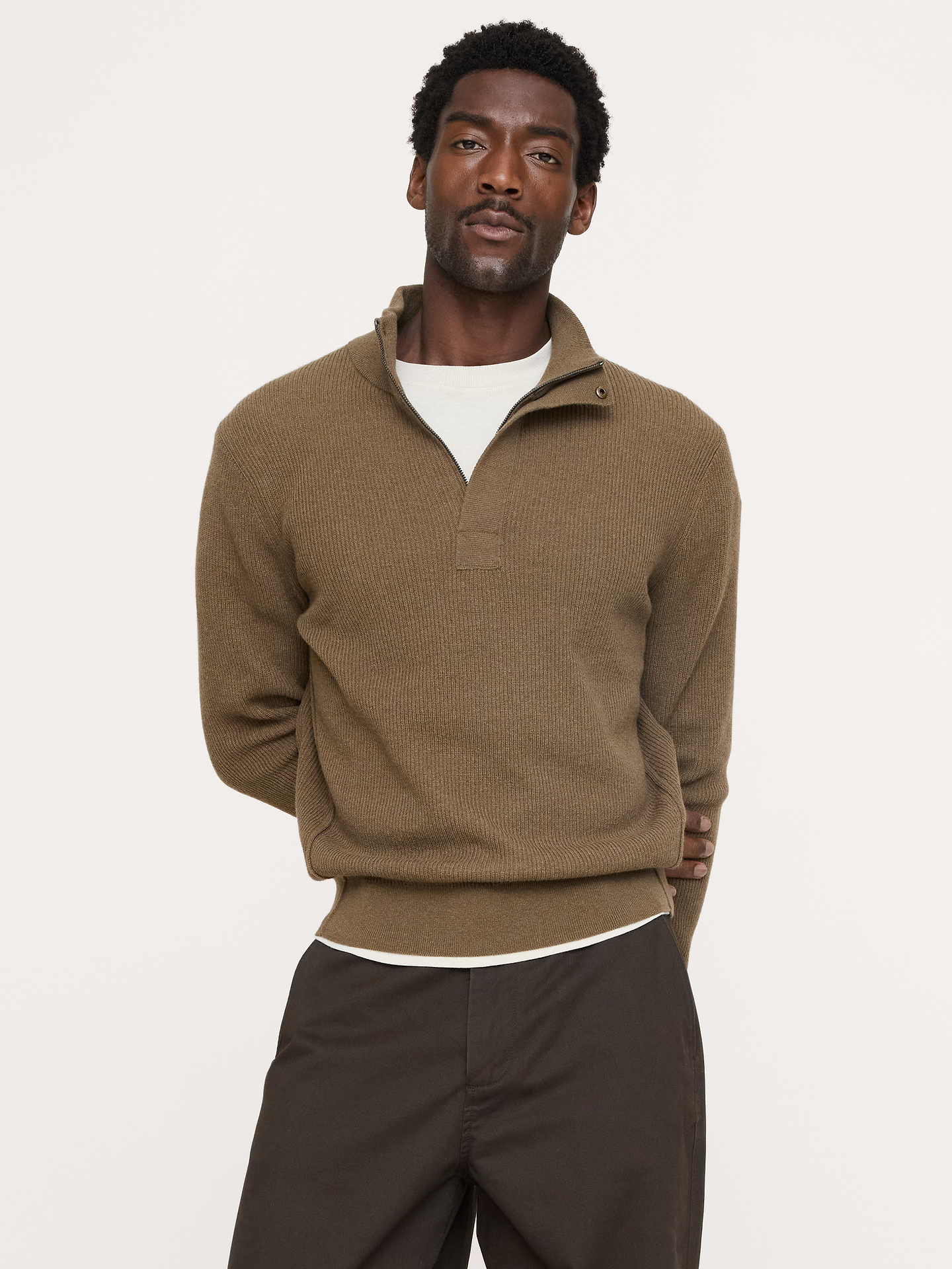 Image 1 of 5, Look closely: this moto-inspired quarter-zip sweater uses the diagonal side seam shaping of the classic jacket. Crafted from a luxe Merino wool blend with ribbed-knit stitches and a mock neck., Standard fit: A straight and easy fit., Fabric from Italy's Filpucci mill., Mock neck with covered zip placket and hidden metal snap detail., Straight hem., Product #906652