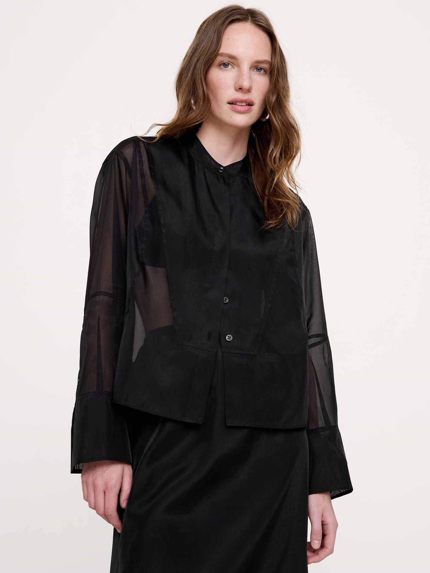 Image 1 of 5, Our take on the season's sheer trend, this tuxedo shirt is cut from soft organza that shows a little more than your typical black-tie version., Oversized Fit: Extra room through chest, shoulders, and waist. Dropped shoulder seam., Banded collar with button placket., High-low hem., Unlined., Product #1183808