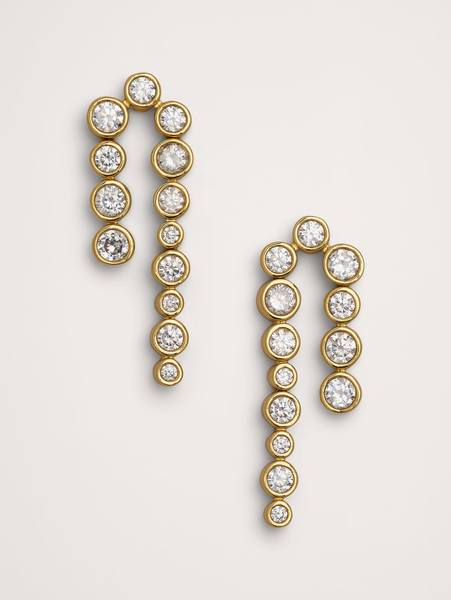 Image 1 of 2, Graduated, bezel-set stone earrings with light-reflecting movement., Post backs., Product #1193067