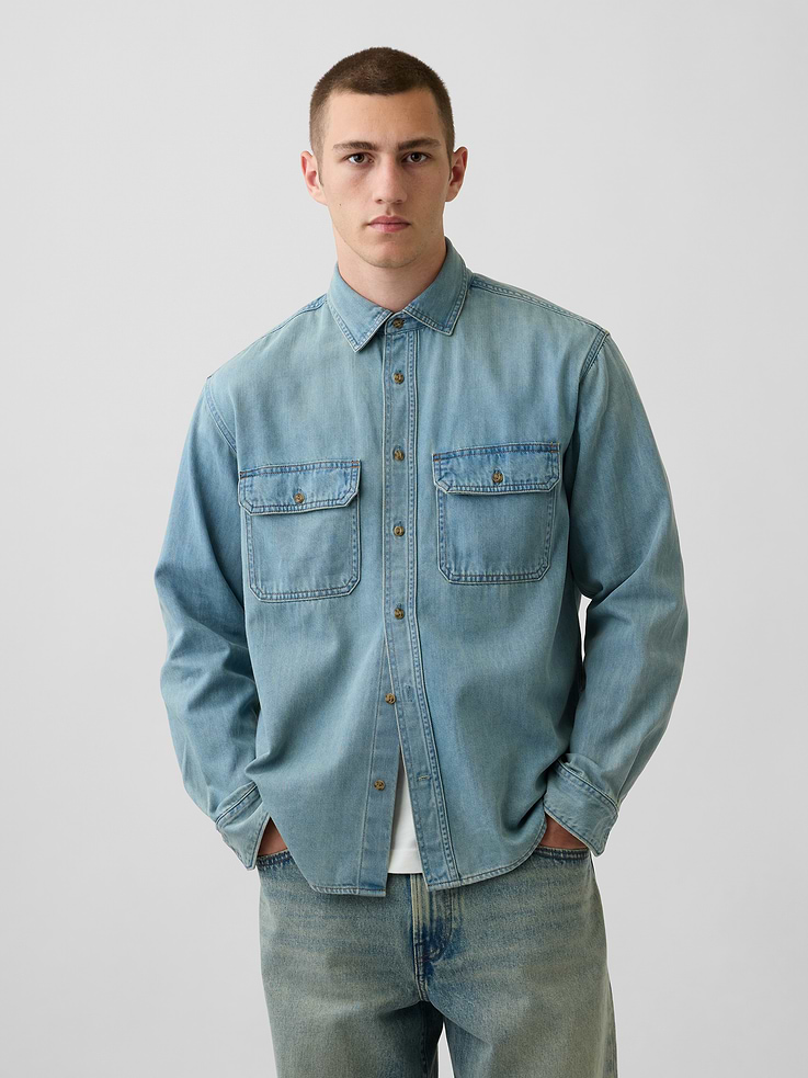 Image 1 of 6, The softest denim ever made. Our exclusive, ultra-light Tencel™ blend with an easy drape for year-round wears., Supersoft cotton-Tencel blend denim button-up utility shirt. In a relaxed fit., Spread collar., Long sleeves with button cuffs., Button front., Back yoke seam., Chest button-flap patch pockets., Light tint., Responsibly Made: This denim shirt is part of our water-saving Washwell program. Compared with conventional wash methods, Washwell uses at least 20% less water., More Sustainable Cotton: Made with 5% recycled cotton. Compared to virgin materials, using recycled materials helps reduce resource use and waste., Product #1180457