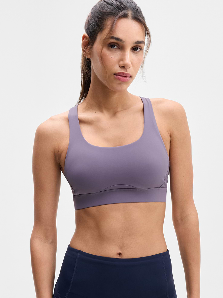 Image 1 of 4, BEST FOR CARDIO: run + train + HIIT, IMPACT: Medium-impact workouts, best for A-C cups, FEEL: PowerMove fabric is sleek, weightless, and helps keep you cool with quick-drying properties, FAVE: Stay-put straps and shaping seams for a secure, sculpted fit, Built-in pockets with removable pads for optional coverage, Removable pads hold their shape from wash to wear, Lined with PowerMesh for breathable, sheer-proof coverage, Easily pairs with the Empower Mastectomy Bra Insert, Product #413272