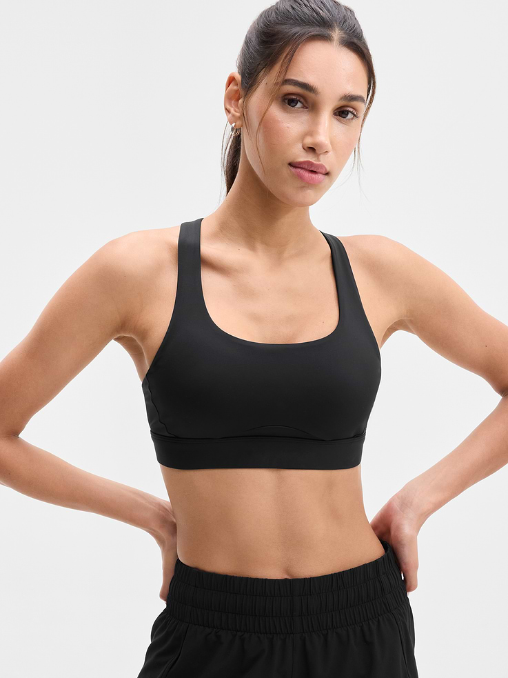 Image 1 of 4, BEST FOR CARDIO: run + train + HIIT, IMPACT: Medium-impact workouts, best for A-C cups, FEEL: PowerMove fabric is sleek, weightless, and helps keep you cool with quick-drying properties, FAVE: Stay-put straps and shaping seams for a secure, sculpted fit, Built-in pockets with removable pads for optional coverage, Removable pads hold their shape from wash to wear, Lined with PowerMesh for breathable, sheer-proof coverage, Easily pairs with the Empower Mastectomy Bra Insert, Product #413272