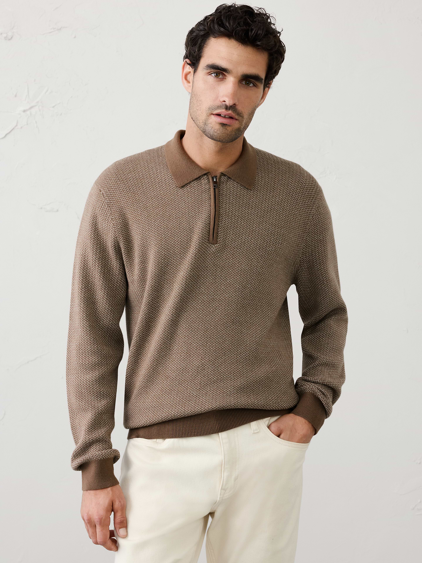 Image 1 of 4, A modern update to a timeless classic, this birdseye quarter-zip sweater polo combines refined texture with effortless versatility. Crafted in an allover birdseye knit, it offers subtle dimension and a polished appearance that's equally suited for workdays and weekends., Polo collar with zipper placket. Long sleeves., Ribbed arm cuffs and hem., Made exclusively for Banana Republic Factory., Product #1175813
