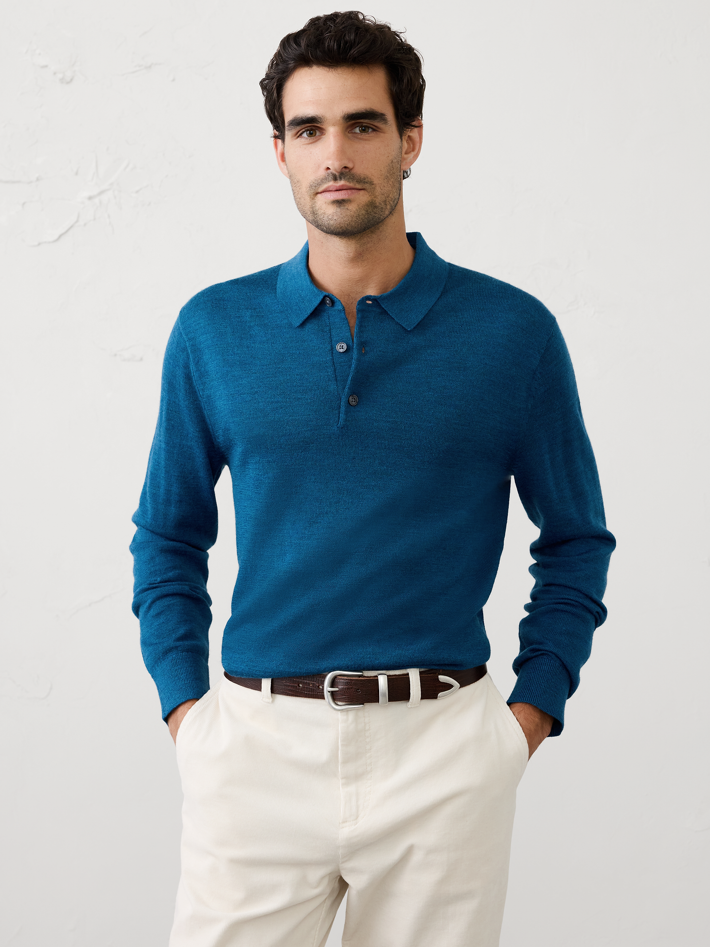 Image 1 of 6, Crafted from 100% merino wool, this long-sleeve polo delivers premium softness, natural warmth, and breathable comfort. A versatile staple that transitions easily from work to weekend, finished with rib-knit cuffs and hem for a refined look., WASHABLE MERINO WOOL: Skip the dry cleaners, this 100% Merino wool sweater is lightweight, comfortable, moisture wicking, odor resistant and machine washable., Polo collar with button placket. Long sleeves., Slight dropped shoulders., Ribbed collar, arm cuffs and hem., Straight hem., Made exclusively for Banana Republic Factory., Product #1175509