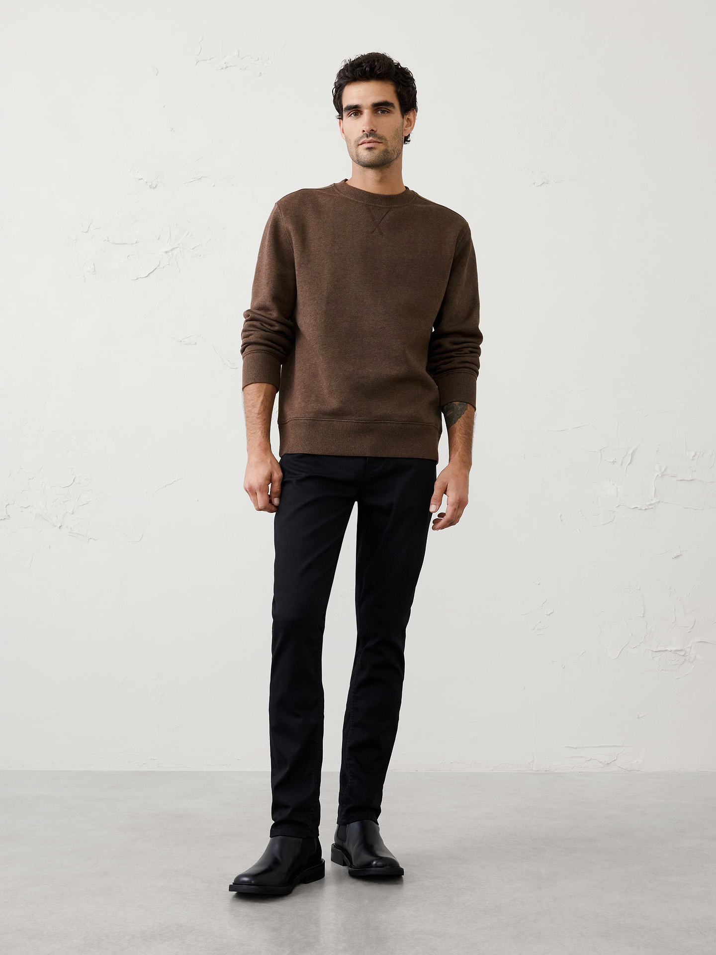 Image 1 of 7, Crafted from soft fleece that’s specially brushed for exceptional softness, this sweatshirt delivers a cozy feel inside and out., Crew neck. Long sleeves., Ribbed neck, arm cuffs and hem., Made exclusively for Banana Republic Factory., Product #1181069