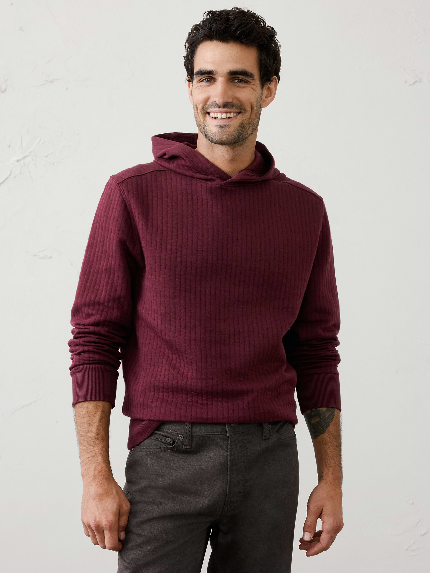 Image 1 of 1, Crafted from a soft quilted fabric, this hoodie delivers lightweight warmth with a textured, elevated look. Designed for easy layering, it offers all‑day comfort and versatility., Hooded. Long sleeves., Ribbed arm cuffs and hem., Made exclusively for Banana Republic Factory., Product #1181075