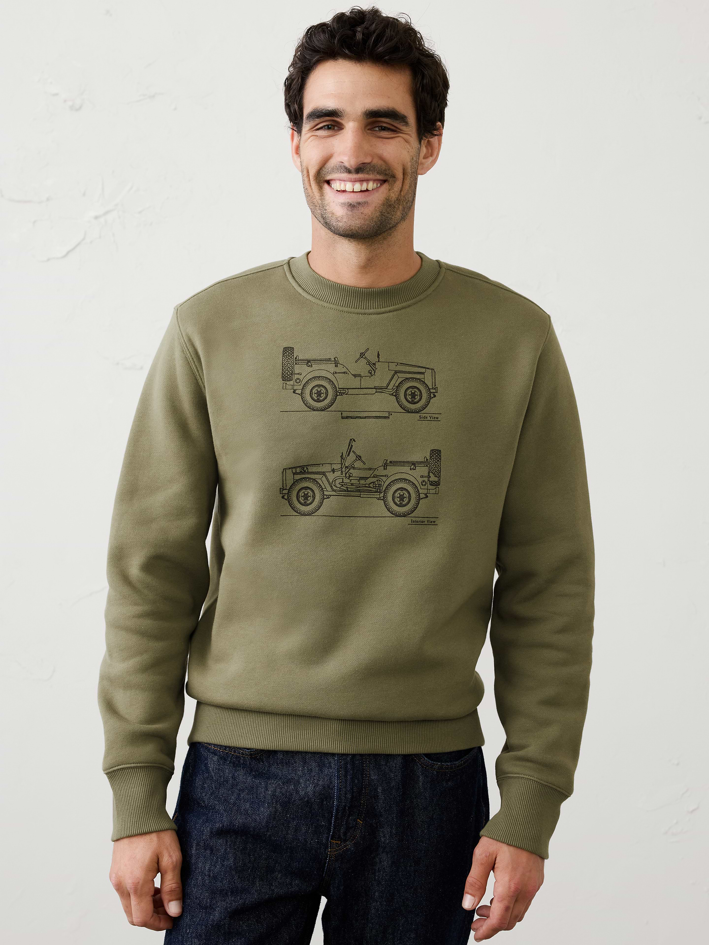 Image 1 of 7, Crafted from soft fleece that’s specially brushed for exceptional softness, this sweatshirt delivers cozy comfort with a warm, lived‑in feel. A unique heritage‑inspired graphic adds character and vintage appeal., Crew neck. Long sleeves., Ribbed neck, arm cuffs and hem., Made exclusively for Banana Republic Factory., Product #1181080