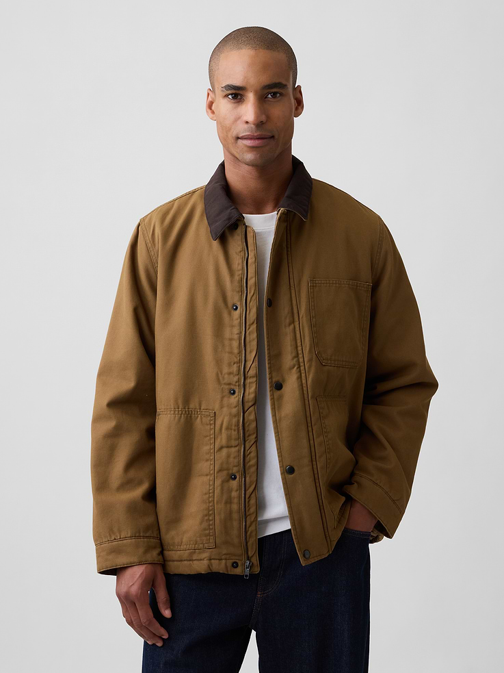 Image 1 of 5, Smooth canvas weave with interior padding., Long sleeves., Spread collar, snap closures at zip front., Patch pockets at chest and lower front., This product was made in a factory that invests in gender equity and women’s empowerment through RISE. Learn more at, Product #1178009