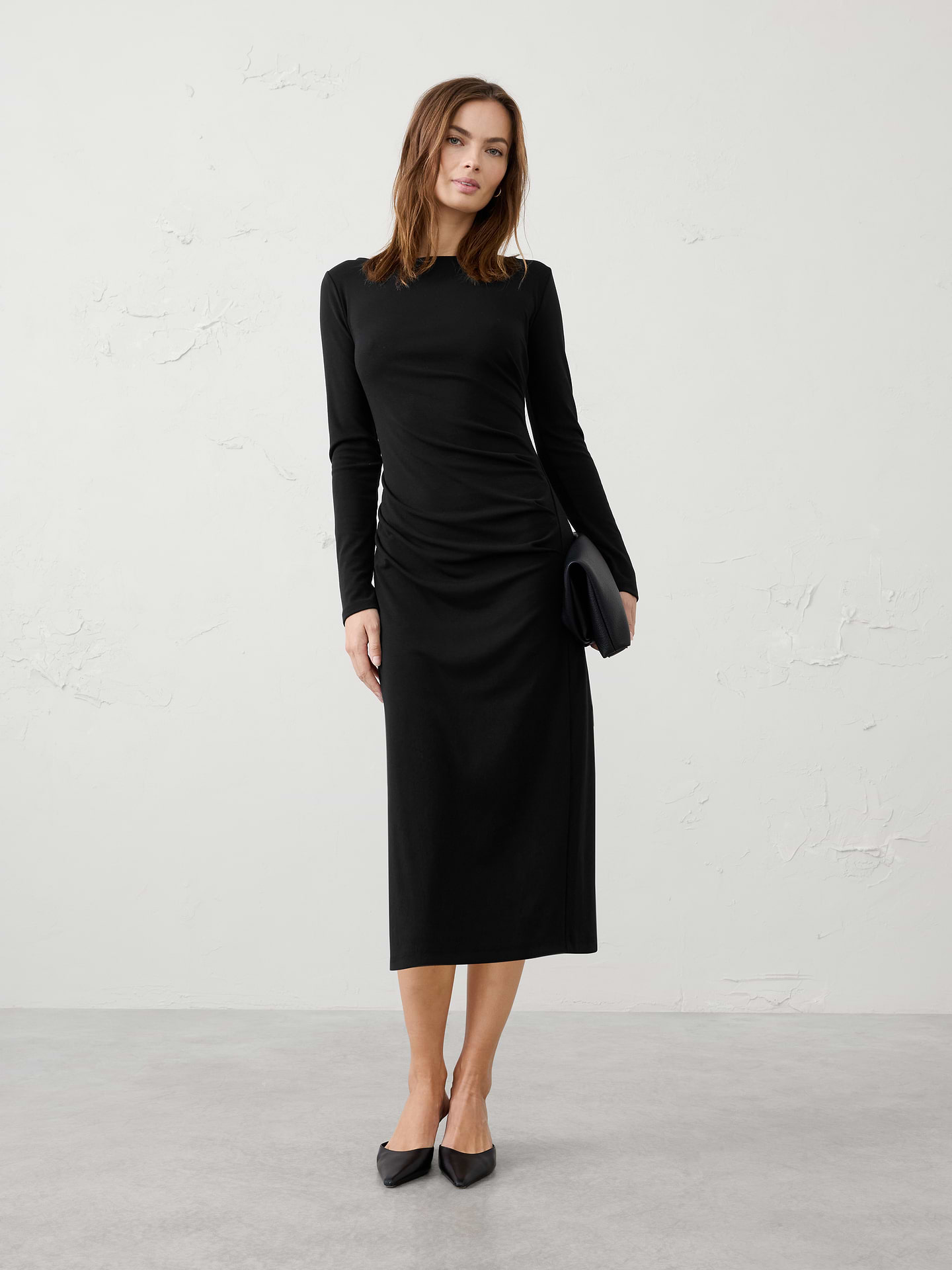Image 1 of 3, Crafted in our customer‑favorite Cozy Rib fabric, this midi dress is elevated with flattering asymmetric draping that creates an effortlessly sculpted silhouette. Soft stretch and refined detailing make it an easy choice for day‑to‑night dressing., SUSTAINABILITY: Made with 60% recycled polyester., Wide boat neckline. Long sleeves., Asymmetrical draped panel overlays the front bodice for a flattering effect., Fitted at the waist., Straight skirt silhouette creates a refined, elongated look., Made exclusively for Banana Republic Factory., Product #1185682