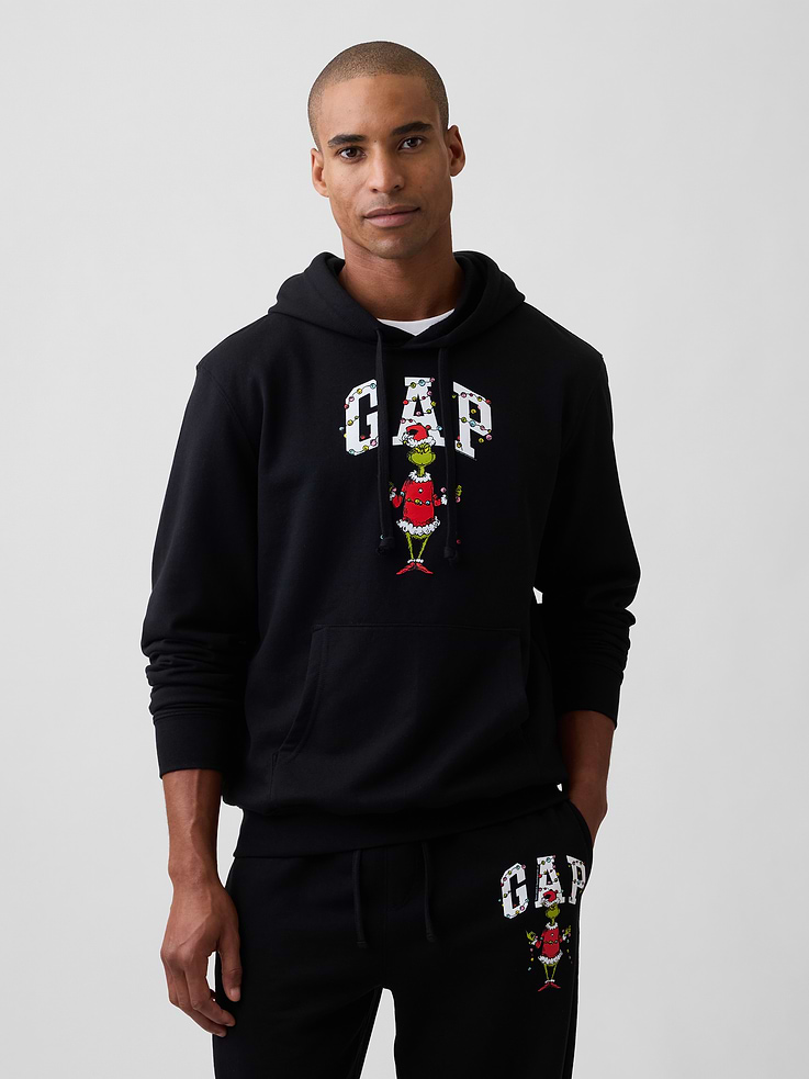 Image 1 of 4, Soft, comfy fleece., Dropped shoulder, long sleeves with banded cuffs., Drawcord ties at hood., Gap logo with Dr. Seuss graphic at front., Kanga pocket., Banded hem., Product #1189430