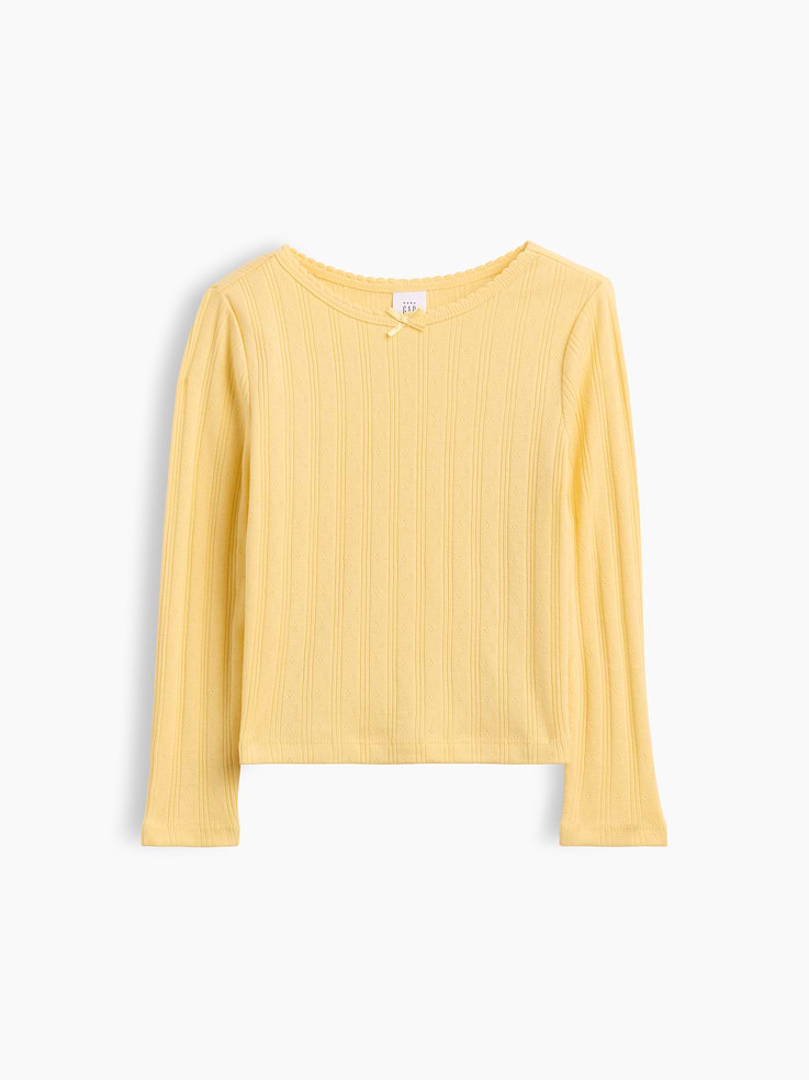Image 1 of 2, Soft, ribbed pointelle-knit T-shirt., Round neckline with scalloped edge and tacked satin ribbon bow., Long sleeves., Product #1183552