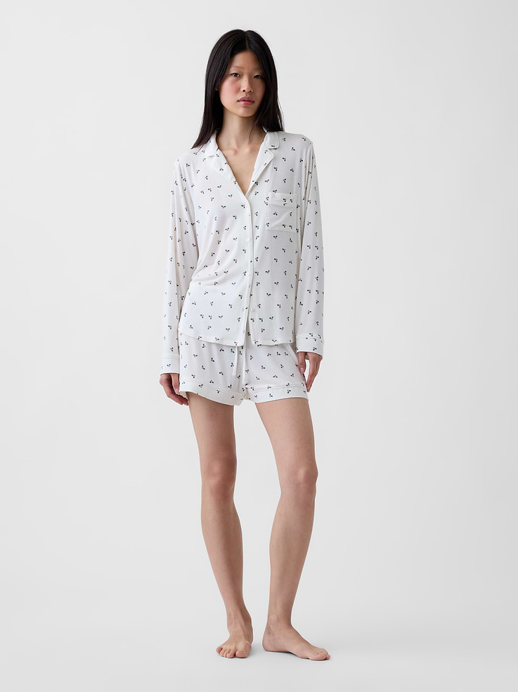 Image 1 of 6, The modal PJs of your dreams. Buttery soft. Naturally cool. With a little stretch. For sleeping, lounging, comfortably., Soft, stretch modal-blend pajama sleep shorts., Elasticized waist with drawcords., Piping allover., Certain styles have allover prints., This product was made in a factory that invests in gender equity and women’s empowerment through RISE. Learn more at gapinc.com/equity ., Product #728674