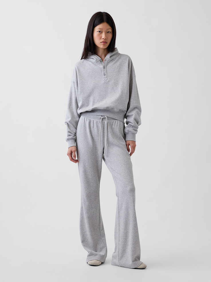 Image 1 of 6, Soft cotton-blend French terry flare sweatpants., Elasticized waist with drawcords., Made with 52% Protocol cotton verified by the U.S. Cotton Trust Protocol, a program which works with farms committed to improving their environmental footprint by minimizing water usage and improving soil health (Claim No. 10127)., Made with 23% recycled polyester. Compared to virgin materials, using recycled materials helps reduce resource use and waste., Product #915184