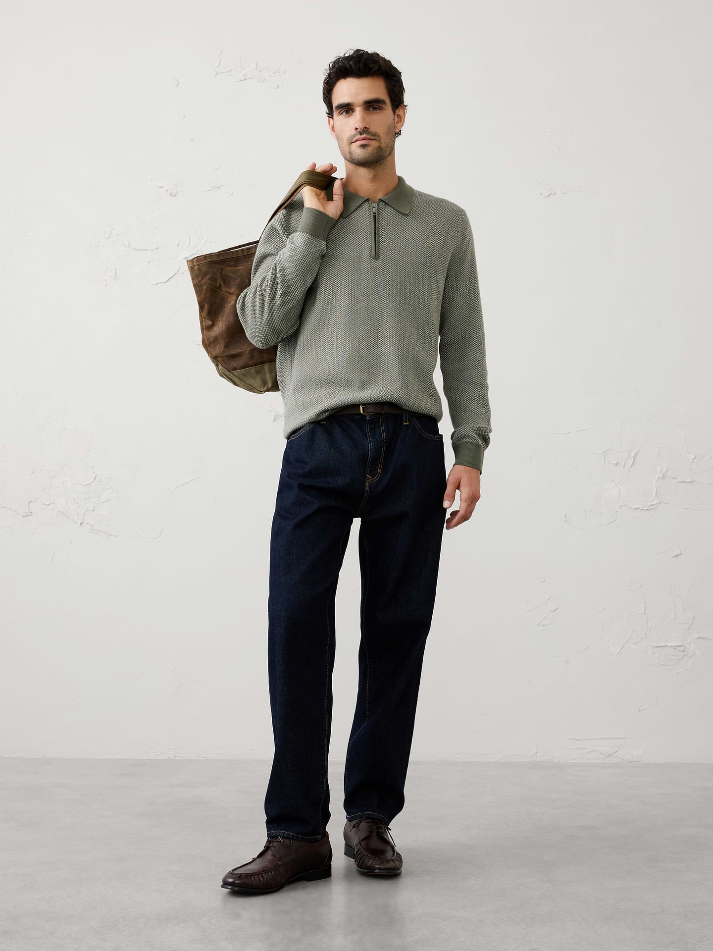 Image 1 of 4, A modern update to a timeless classic, this birdseye quarter-zip sweater polo combines refined texture with effortless versatility. Crafted in an allover birdseye knit, it offers subtle dimension and a polished appearance that's equally suited for workdays and weekends., Polo collar with zipper placket. Long sleeves., Ribbed arm cuffs and hem., Made exclusively for Banana Republic Factory., Product #1175813