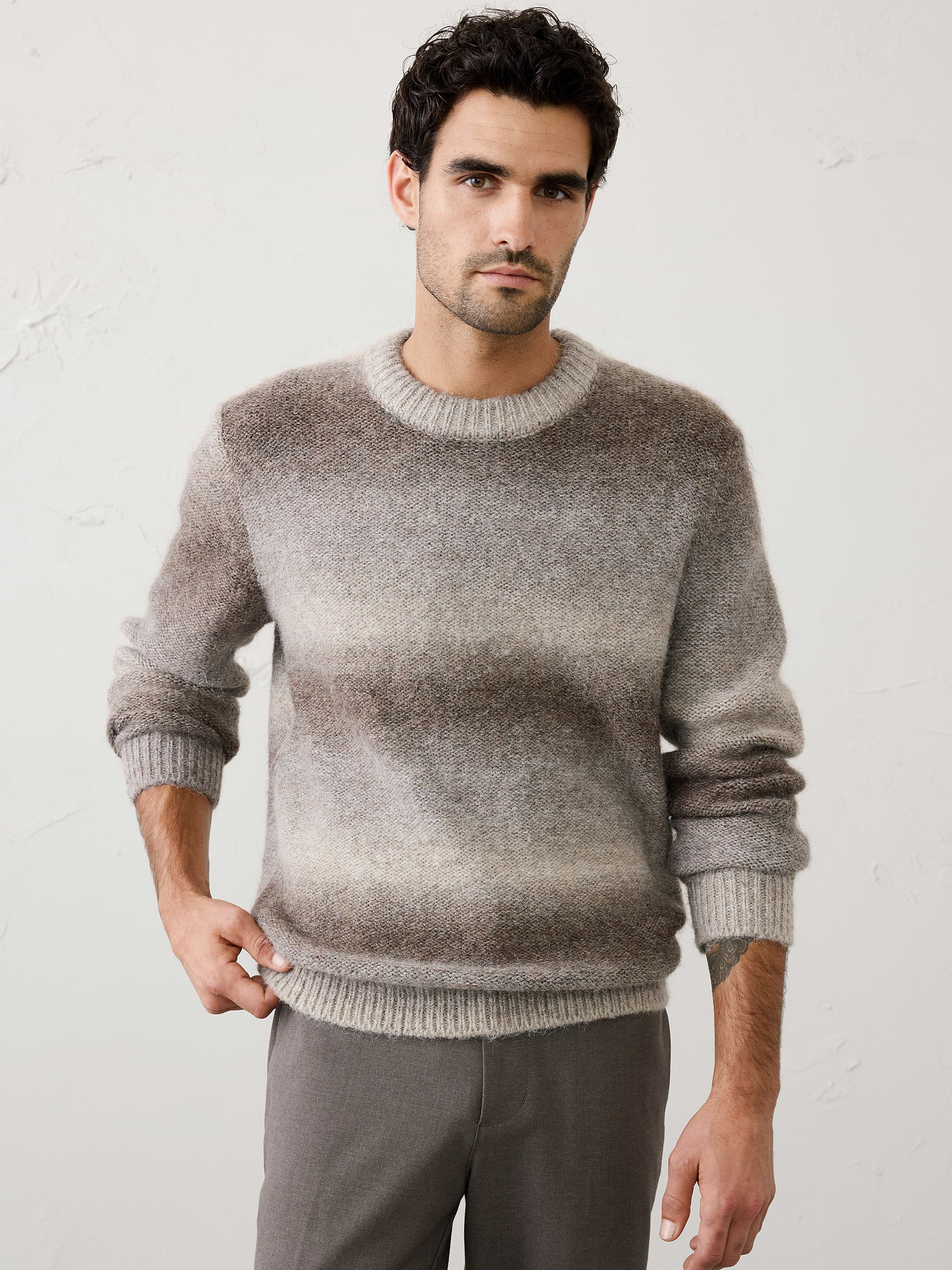 Image 1 of 4, Designed to stand out, this sweater features a striking ombré pattern crafted in a soft, brushed yarn with a plush, fuzzy texture. Perfect for holiday parties, nights out, or anytime you want to make an impression, it brings personality and effortless style to the season., Crew neck. Long sleeves., Ribbed neckline, arm cuffs and hem., Made exclusively for Banana Republic Factory., Product #1175825