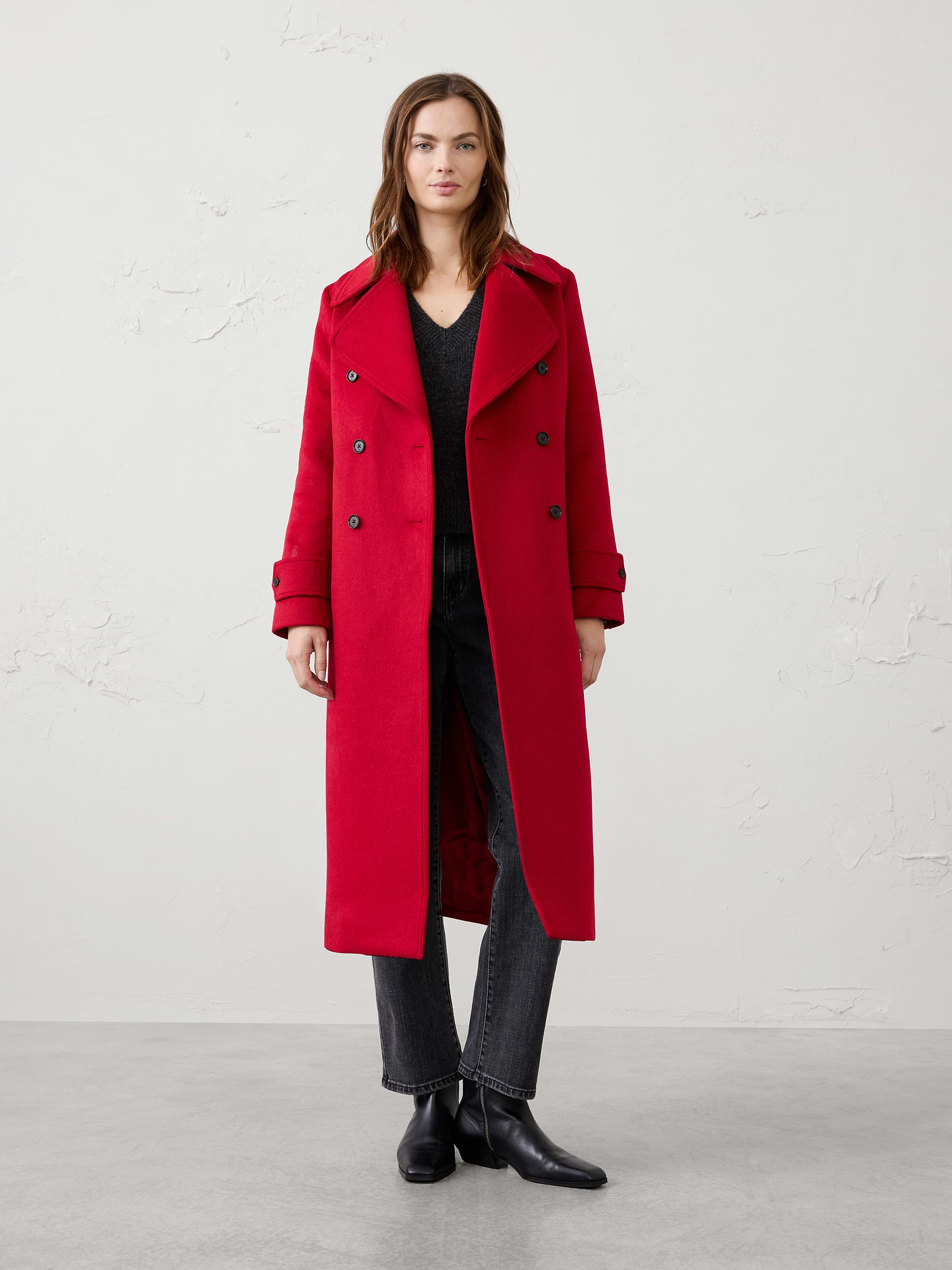 Image 1 of 4, Make a statement in timeless outerwear with this double-breasted coat, expertly tailored for a polished and sophisticated look. Designed with a longline silhouette, wide notch lapels, and a classic double-breasted button front, this coat delivers enduring style season after season., Wide notch lapel collar. Long sleeves with button cuff tab detailing., Double-breasted button-front closure., Front vertical buttoned flap pockets., Center back vent., Fully lined., Made exclusively for Banana Republic Factory., Product #1178060
