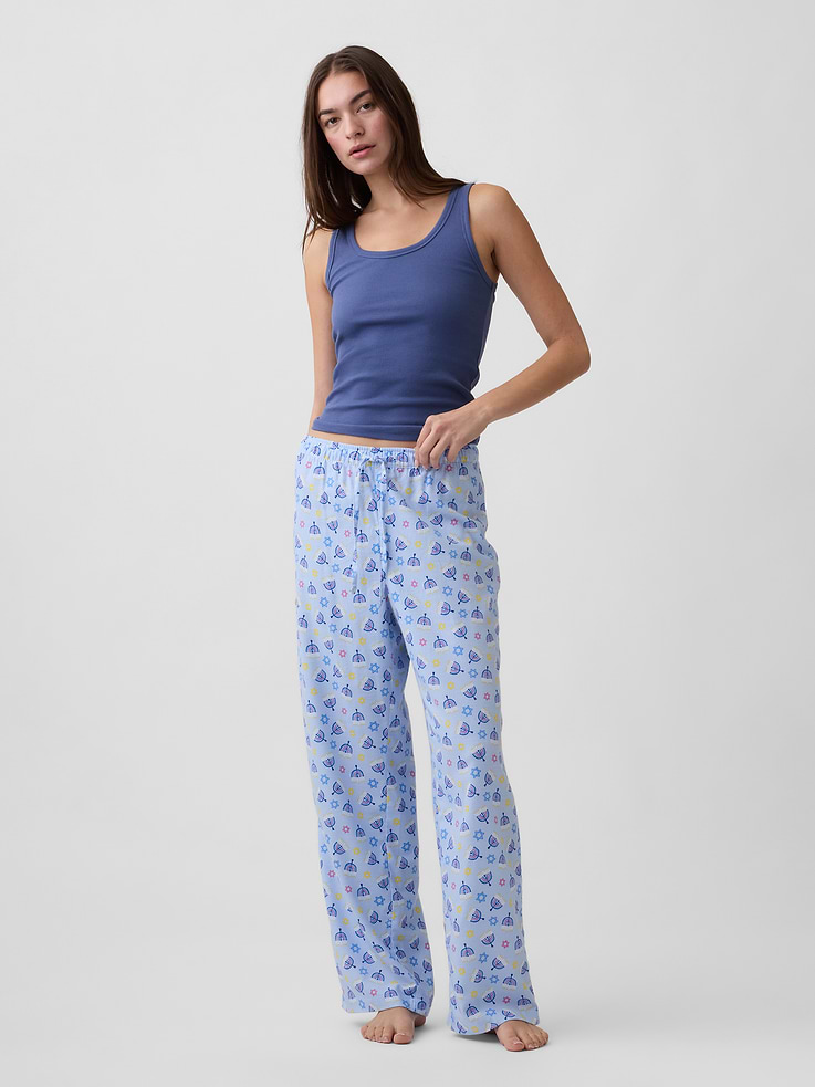 Image 1 of 4, Smooth flannel sleep pants., Drawcord ties at elasticized waist., Select styles have allover holiday print, stripes, or plaid., Shop matching PJs for all., Product #1182139