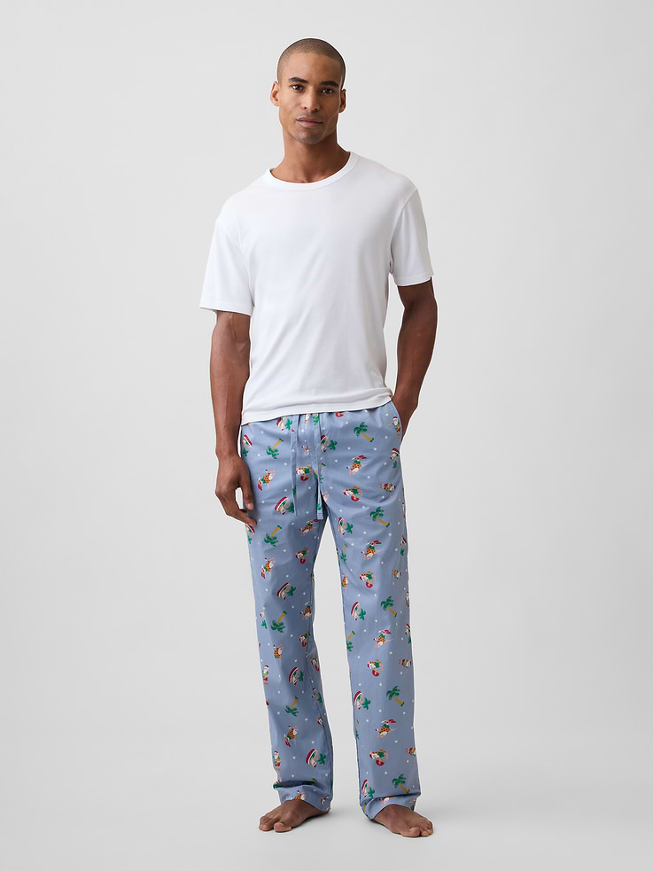 Image 1 of 4, Smooth poplin sleep pants., Drawcord ties at elasticized waist, faux fly., On-seam pockets., Select styles have allover holiday print, stripes, or plaid., Shop matching PJs for all., This product was made in a factory that invests in gender equity and women’s empowerment through RISE. Learn more at, Product #1185626