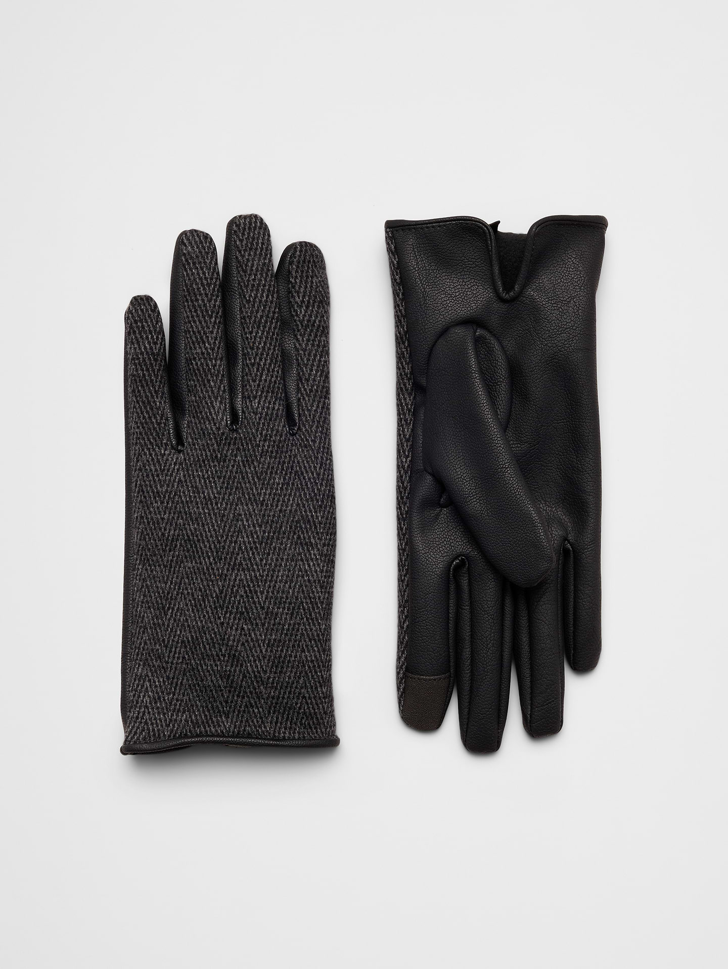 Image 1 of 1, Crafted from smooth vegan leather, these gloves feature a clean, classic design that complements any winter wardrobe. Timeless and versatile, they offer a polished finishing touch while helping keep hands warm throughout the season., VEGAN LEATHER: Soft and smooth, this faux leather looks and feels luxurious., Made exclusively for Banana Republic Factory., Product #1180968