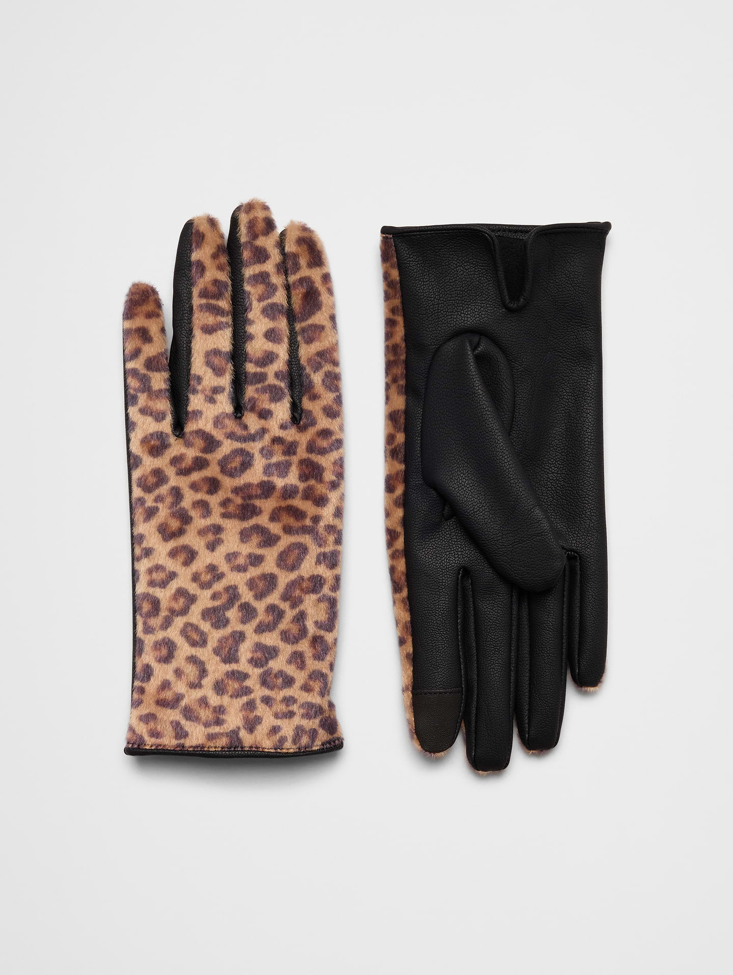 Image 1 of 1, Crafted from smooth vegan leather, these gloves feature a clean, classic design that complements any winter wardrobe. Timeless and versatile, they offer a polished finishing touch while helping keep hands warm throughout the season., VEGAN LEATHER: Soft and smooth, this faux leather looks and feels luxurious., Made exclusively for Banana Republic Factory., Product #1180968