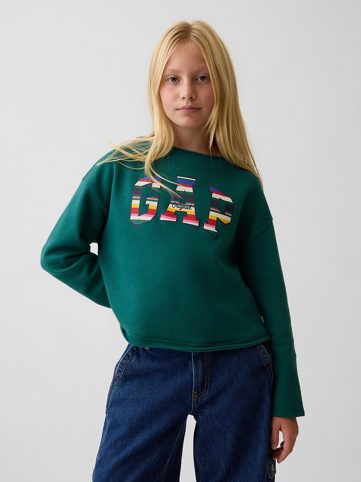 Image 1 of 6, Our softer than soft sweats. Brushed on the inside. Smooth on the outside. Made so that no two are alike., Soft cotton-blend fleece sweatshirt. In a relaxed, boxy fit., Rolled boatneck., Long sleeves., Gap arch logo at front., Rolled hem., Made with 23% recycled polyester. Compared to virgin materials, using recycled materials helps reduce resource use and waste., This product was made in a factory that invests in gender equity and women’s empowerment through RISE. Learn more at gapinc.com/equity ., Product #1185721