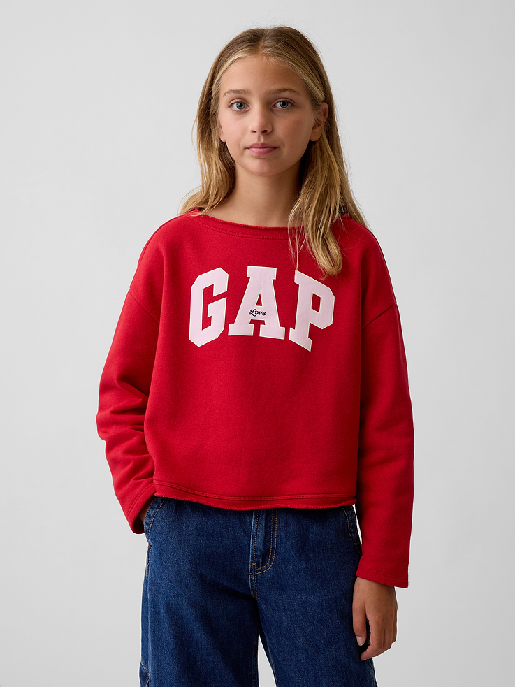 Image 1 of 6, Our softer than soft sweats. Brushed on the inside. Smooth on the outside. Made so that no two are alike., Soft cotton-blend fleece sweatshirt. In a relaxed, boxy fit., Rolled boatneck., Long sleeves., Gap arch logo at front., Rolled hem., Made with 23% recycled polyester. Compared to virgin materials, using recycled materials helps reduce resource use and waste., This product was made in a factory that invests in gender equity and women’s empowerment through RISE. Learn more at gapinc.com/equity ., Product #1185721