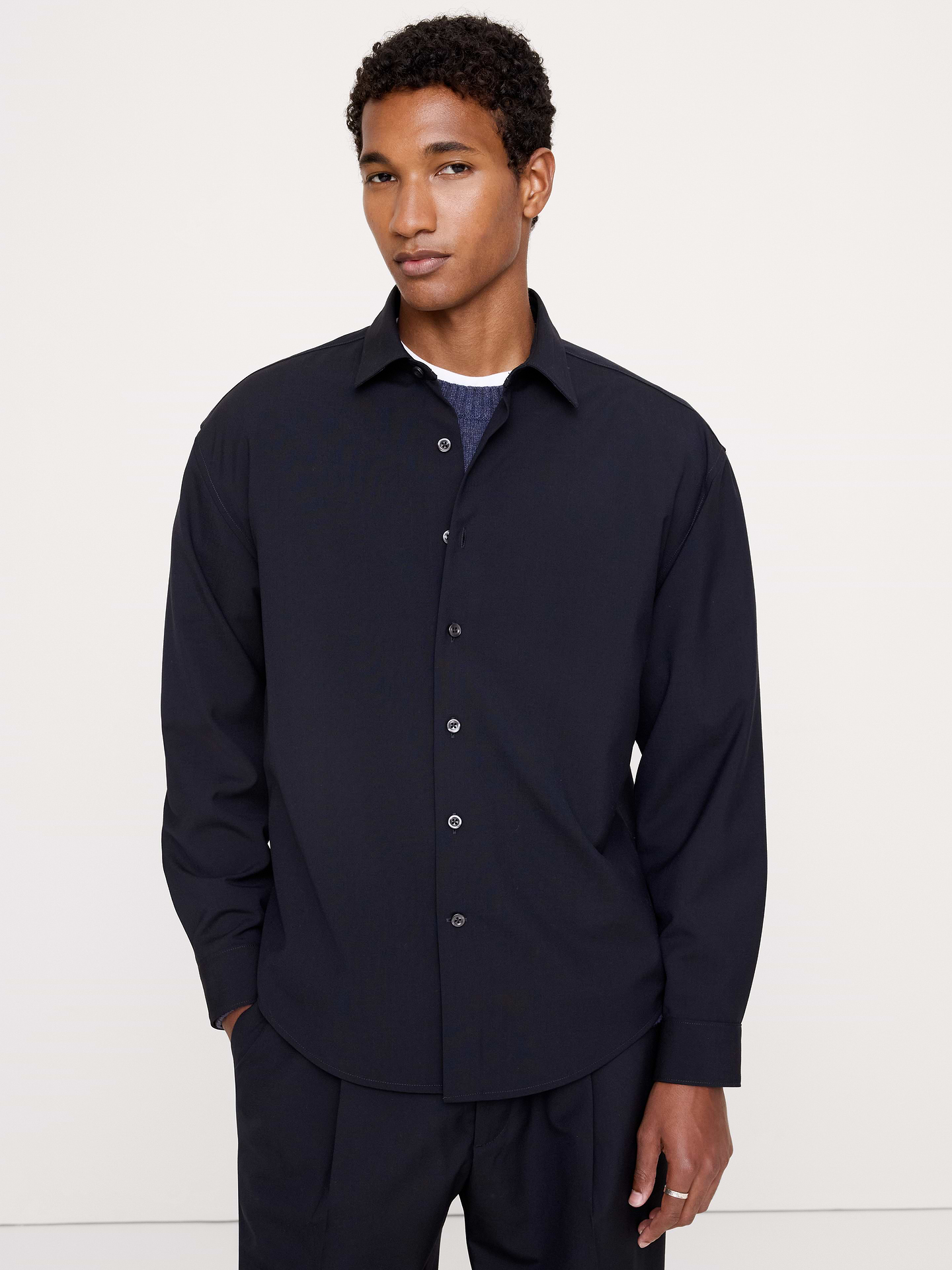 Image 1 of 3, From carry-on to conference room. We made this button-down shirt for comfort that leans more dressed up. Softly tailored for ease and movement, with a lightweight fabric that makes it perfect for layering. Wrinkle-Resistant, Relaxed Fit: A straight & roomy fit with dropped shoulder seams., Point collar with button closure., Shirttail hem., Product #1189460