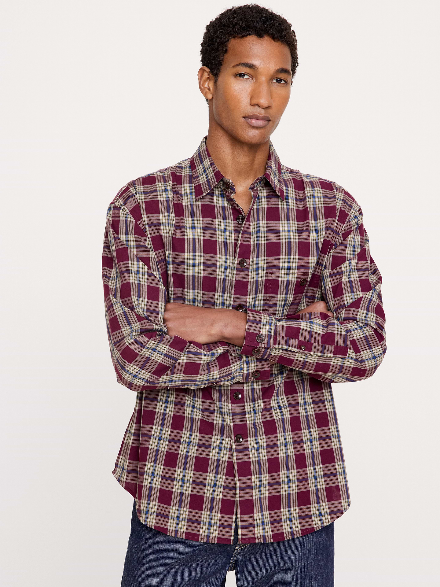 Image 1 of 8, Our best-selling Poplin Shirt, now in a relaxed silhouette, specially washed for a lived-in softness. Iron it for a crisp finish, or skip for a slightly rumpled, casual look., Relaxed Fit: A straight & roomy fit with a dropped shoulder seam., Spread collar with button-front closure., Chest pocket., Shirttail hem., Product #892582