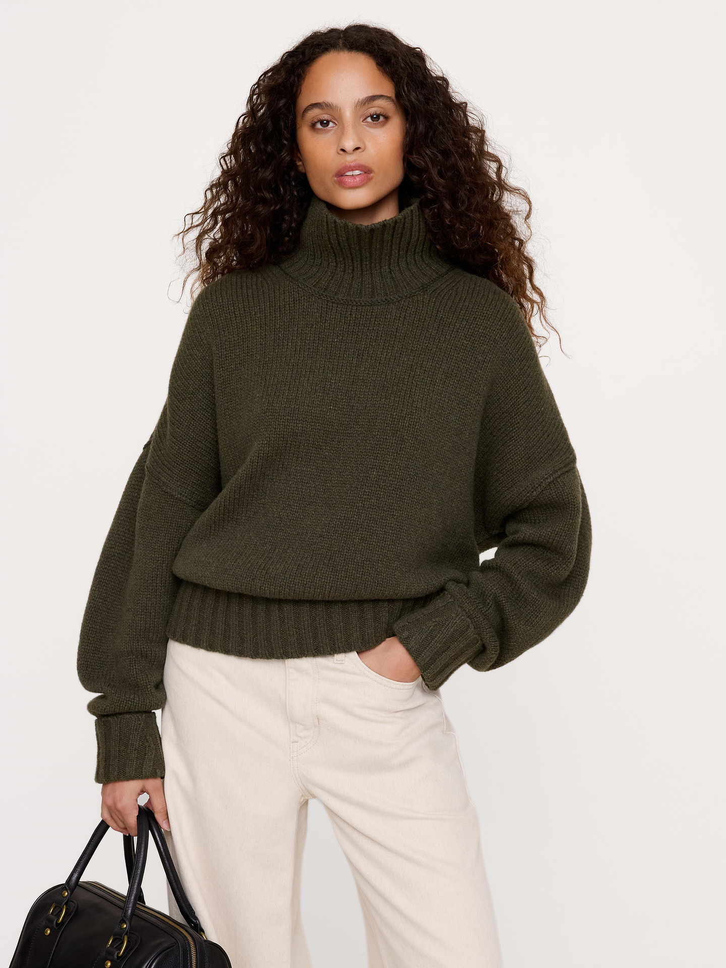 Image 1 of 2, We reimagined the classic turtleneck sweater with reversed seams in our soft and warm wool blend from Italy., Oversized fit: Extra room through chest, shoulders, and waist. Dropped shoulder seams., Fabric from Italy's Filpucci mill., Turtleneck., Straight hem., Product #1180195
