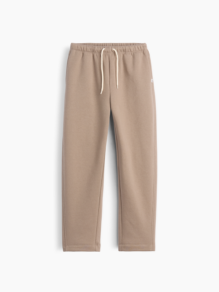 Image 1 of 4, Our softer than soft sweats. Brushed on the inside. Smooth on the outside. Made so that no two are alike., Soft cotton-blend fleece easy pull-on barrel sweatpants. In a relaxed fit., Elasticized waist with drawcords., Side on-seam pockets., Twisted front seams., Certain styles have side graphics., Made with 52% Protocol cotton verified by the U.S. Cotton Trust Protocol, a program which works with farms committed to improving their environmental footprint by minimizing water usage and improving soil health (Claim No. 10127)., Made with 23% recycled polyester. Compared to virgin materials, using recycled materials helps reduce resource use and waste., Product #911944