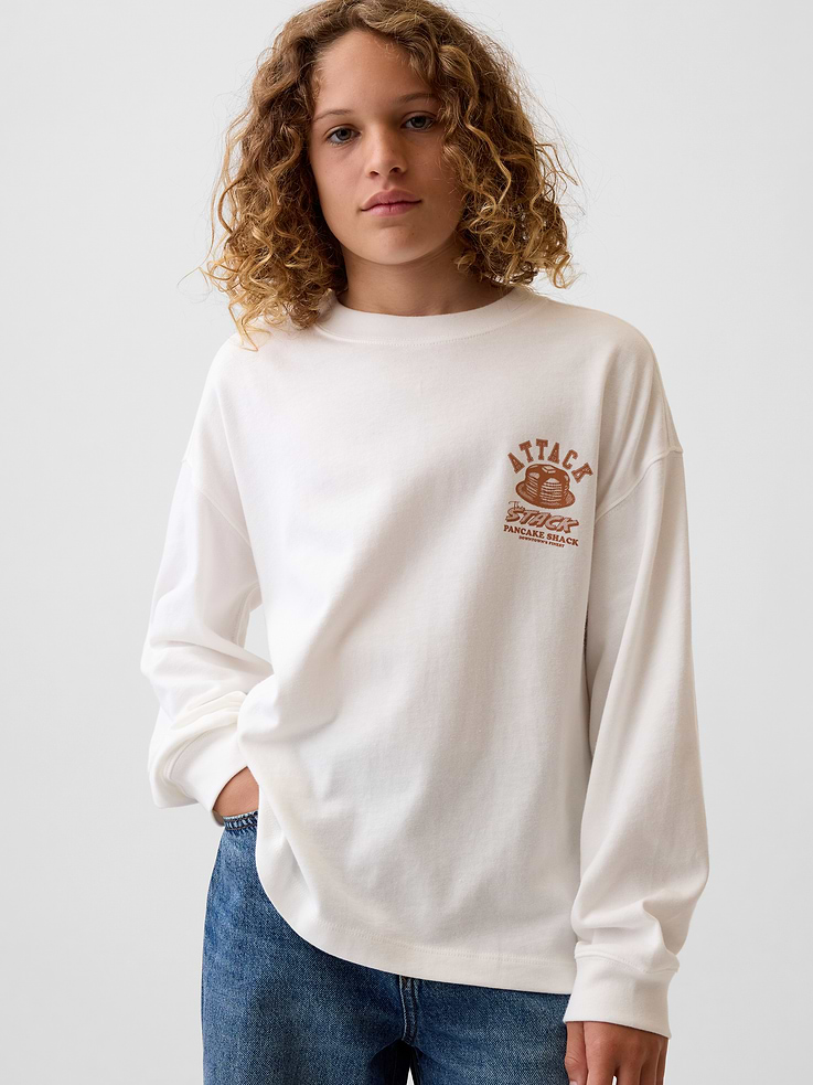 Image 1 of 5, Soft, heavyweight cotton jersey T-shirt. In an oversized fit., Creweneck., Long sleeves with drop shoulders and banded cuffs., Graphics at front and back., This product was made in a factory that invests in gender equity and women’s empowerment through RISE. Learn more at gapinc.com/equity ., Product #1183757